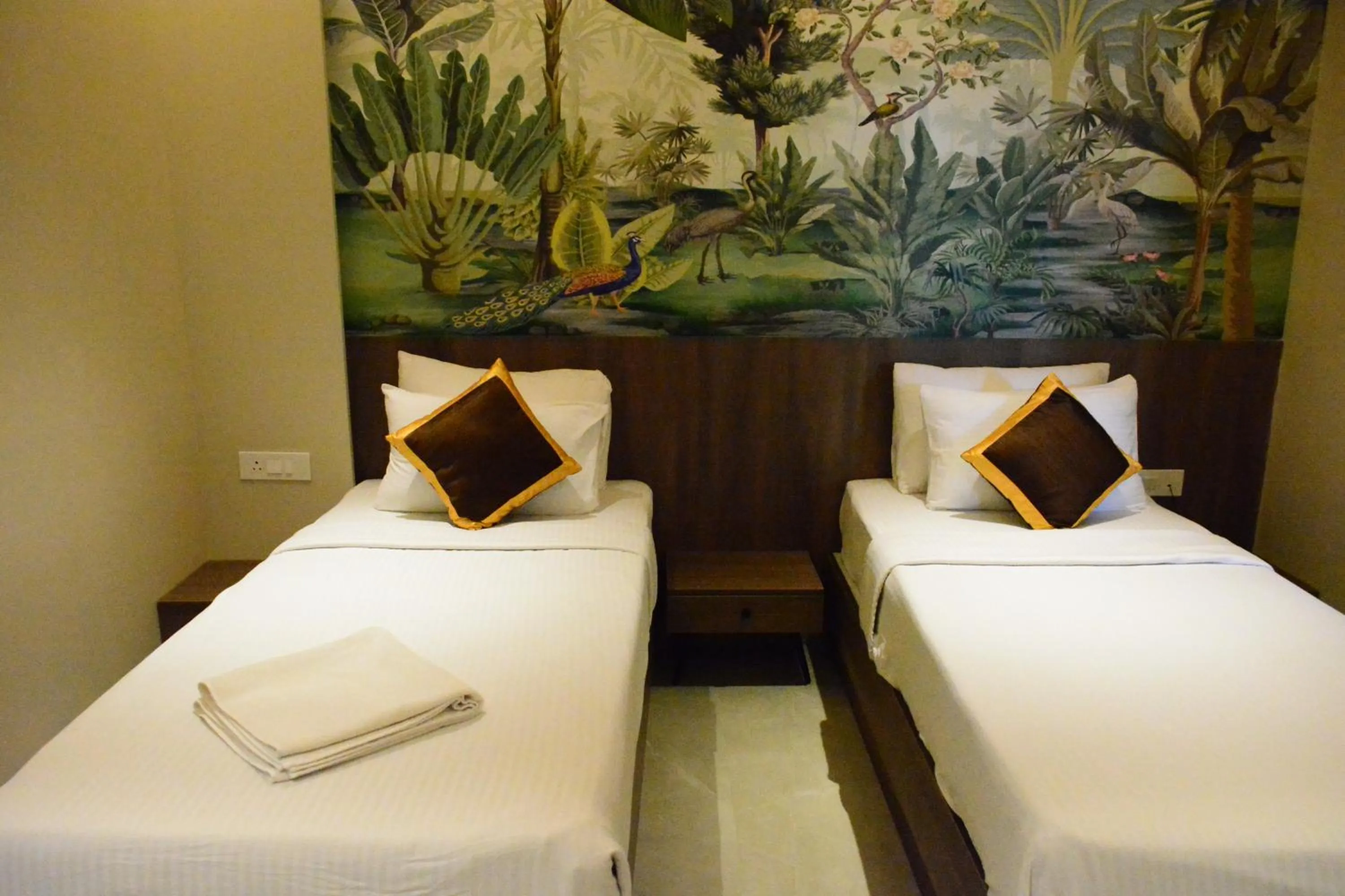 Bed in Hotel Muthahalli Grand
