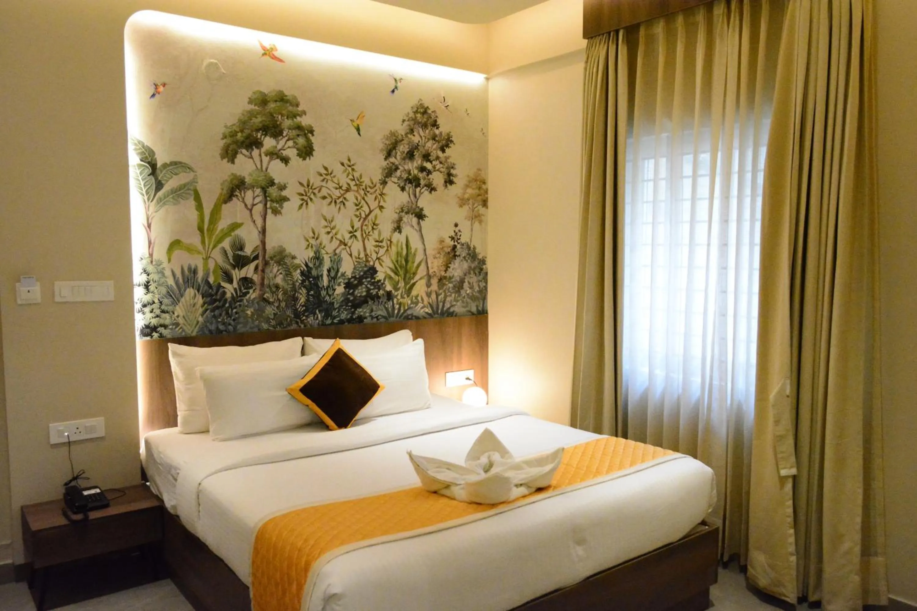 Bed in Hotel Muthahalli Grand