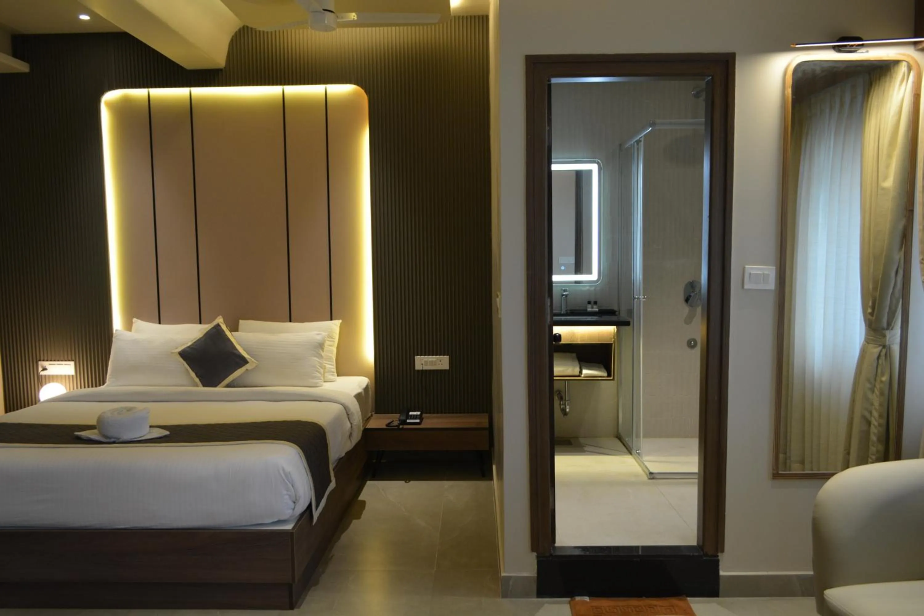 Bed in Hotel Muthahalli Grand