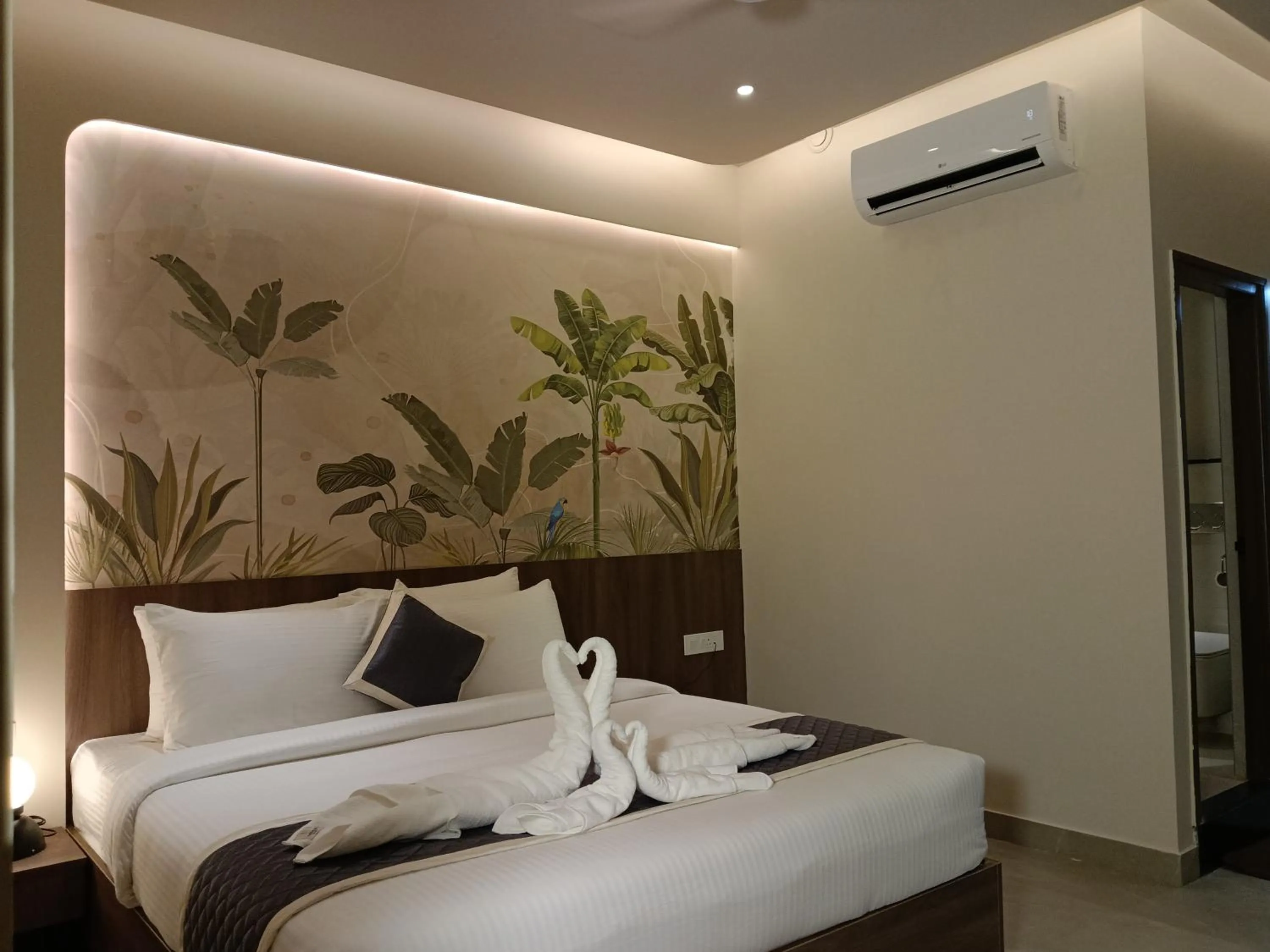 Bed in Hotel Muthahalli Grand