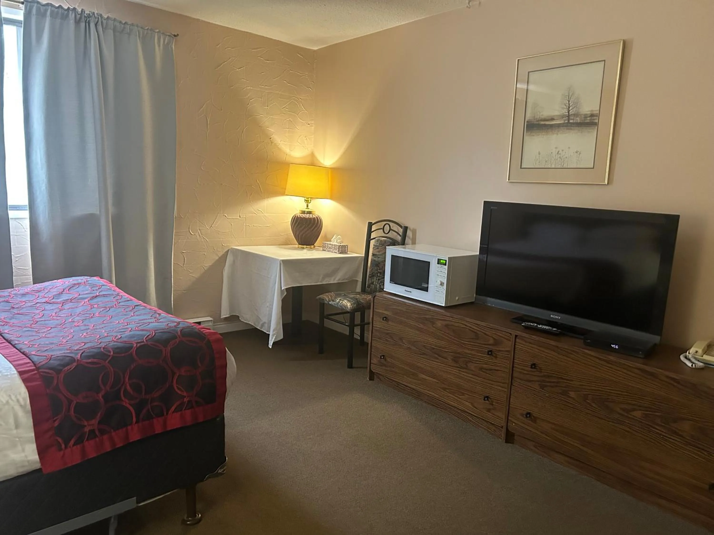 Bed in Villagers Inn