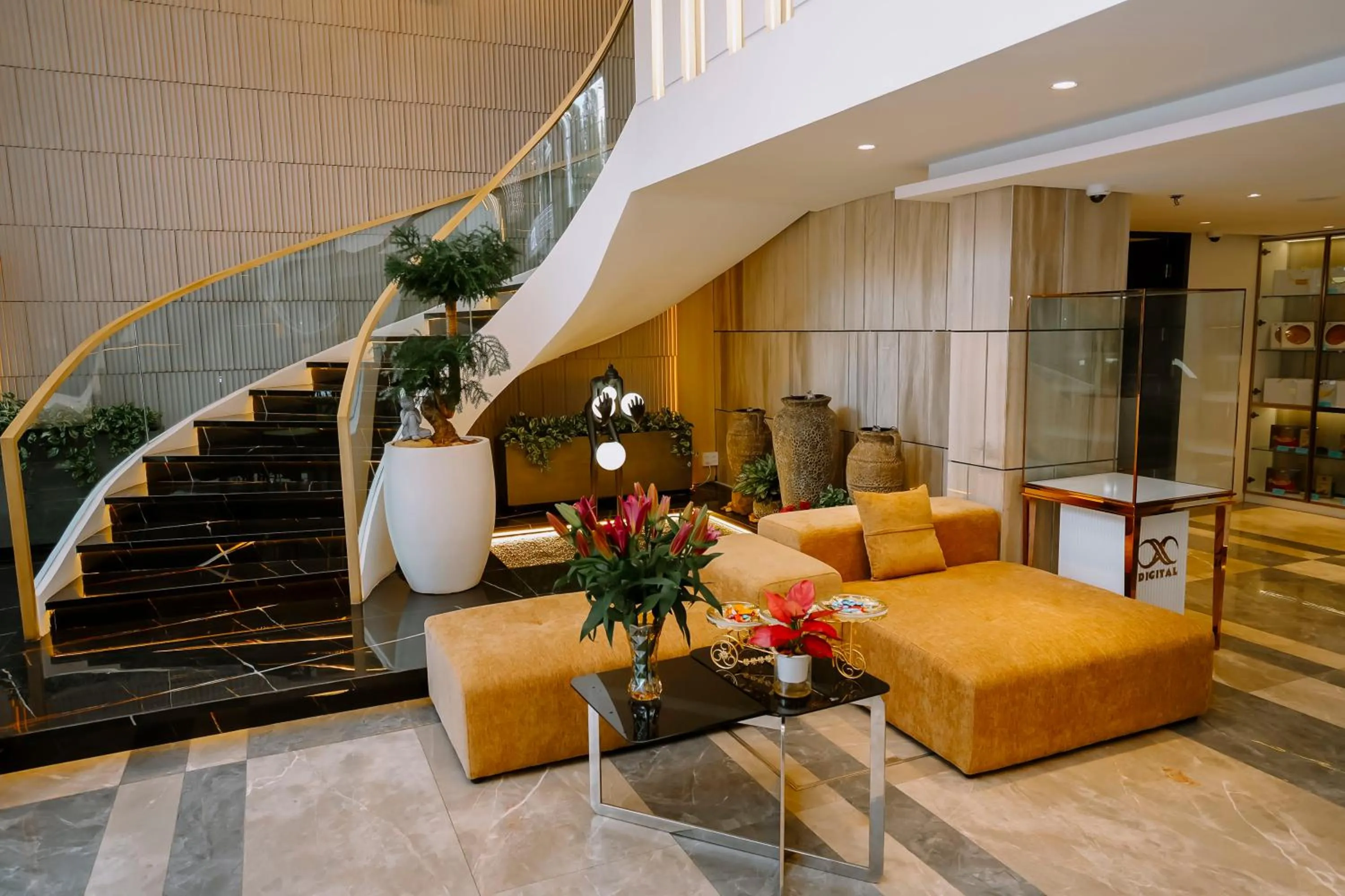 Communal lounge/ TV room in X-Digital HOTEL