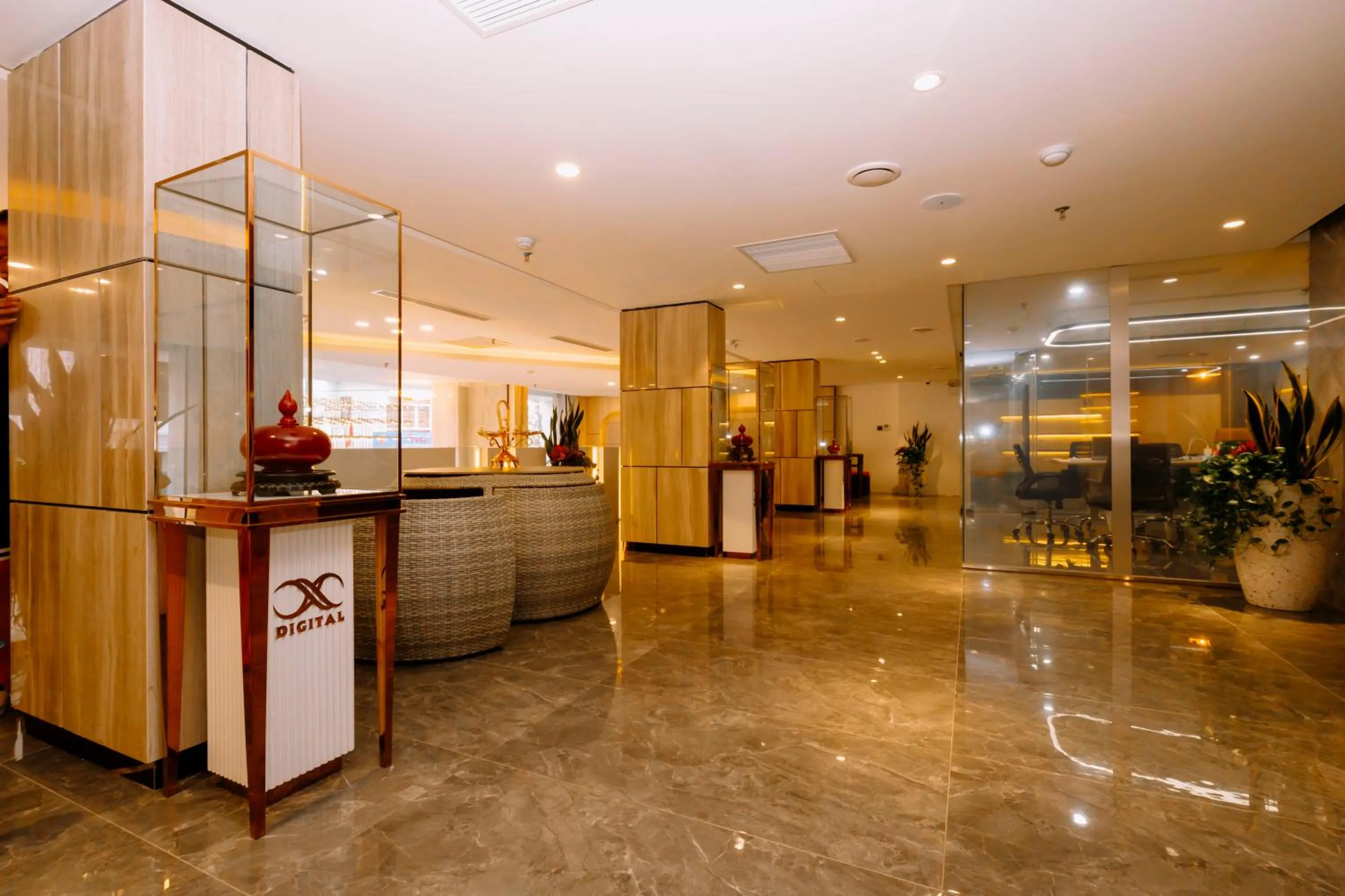 Communal lounge/ TV room in X-Digital HOTEL