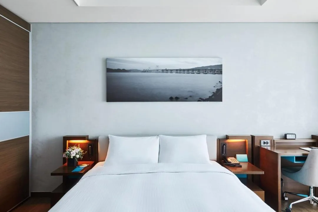 Bed in Felix by STX Hotel & Suite
