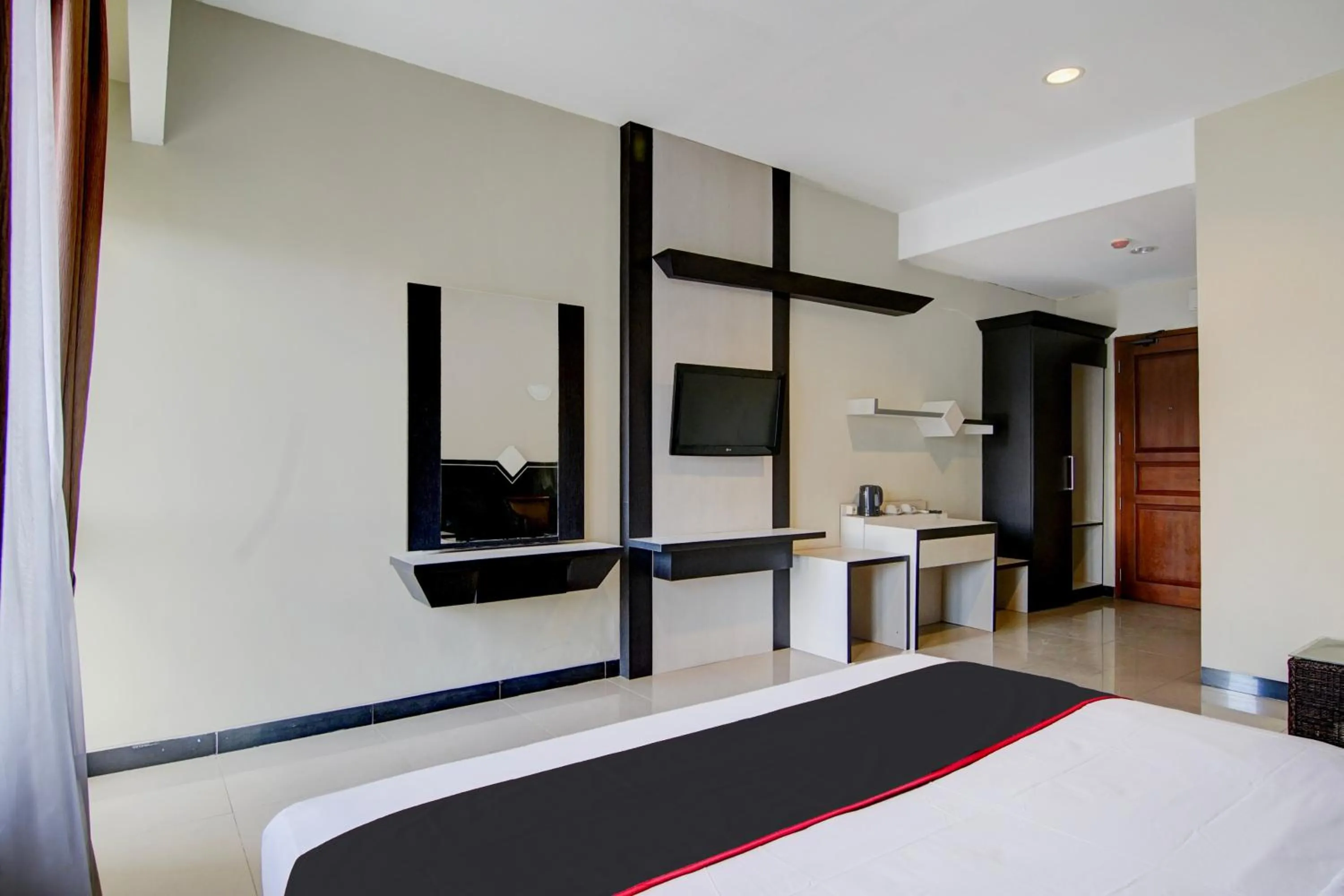 Bedroom, Bed in Townhouse Oak Pekanbaru near Mall Pekanbaru formerly Hotel Grand Sahara