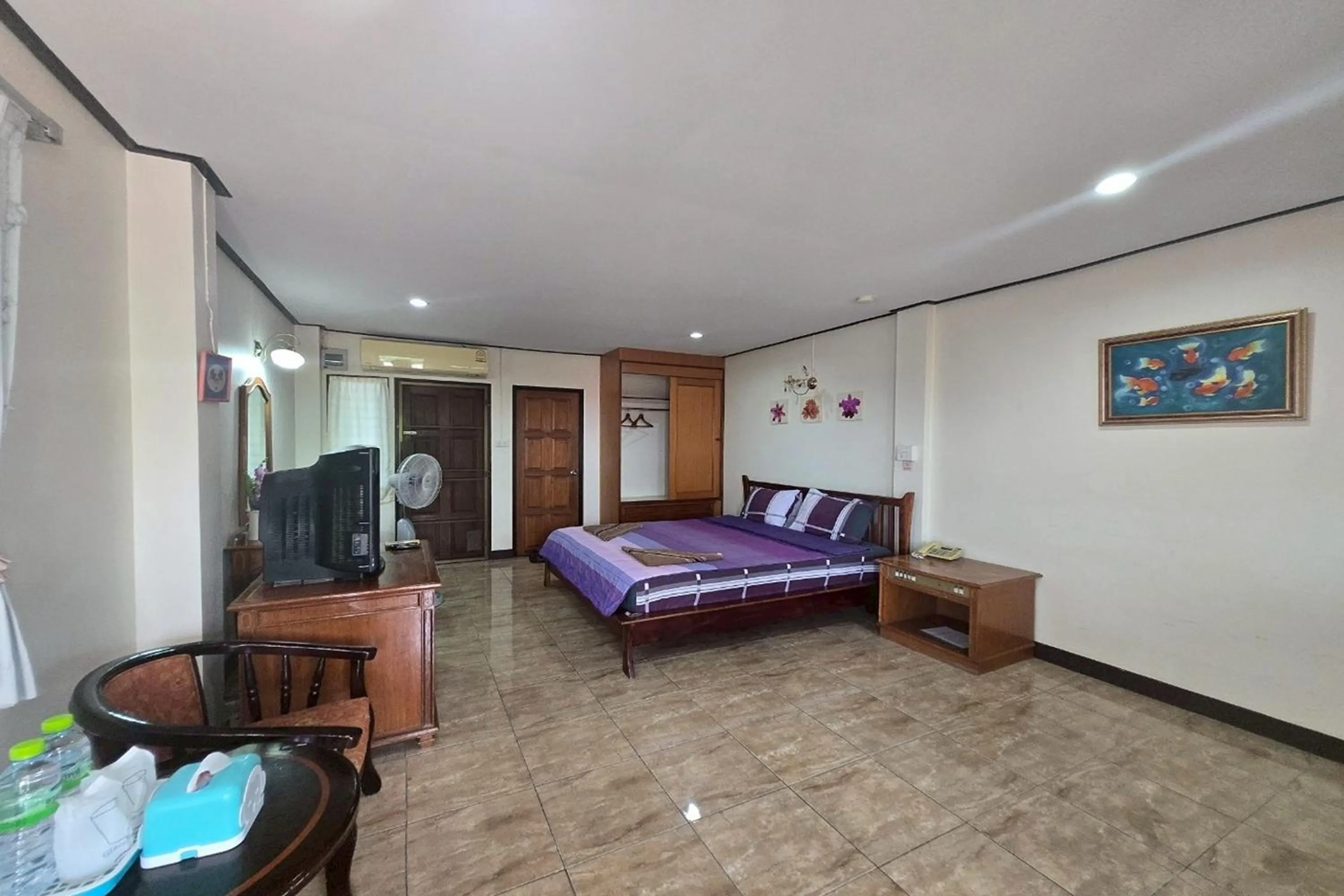 Bed in Phaiboon Hotel & Resort