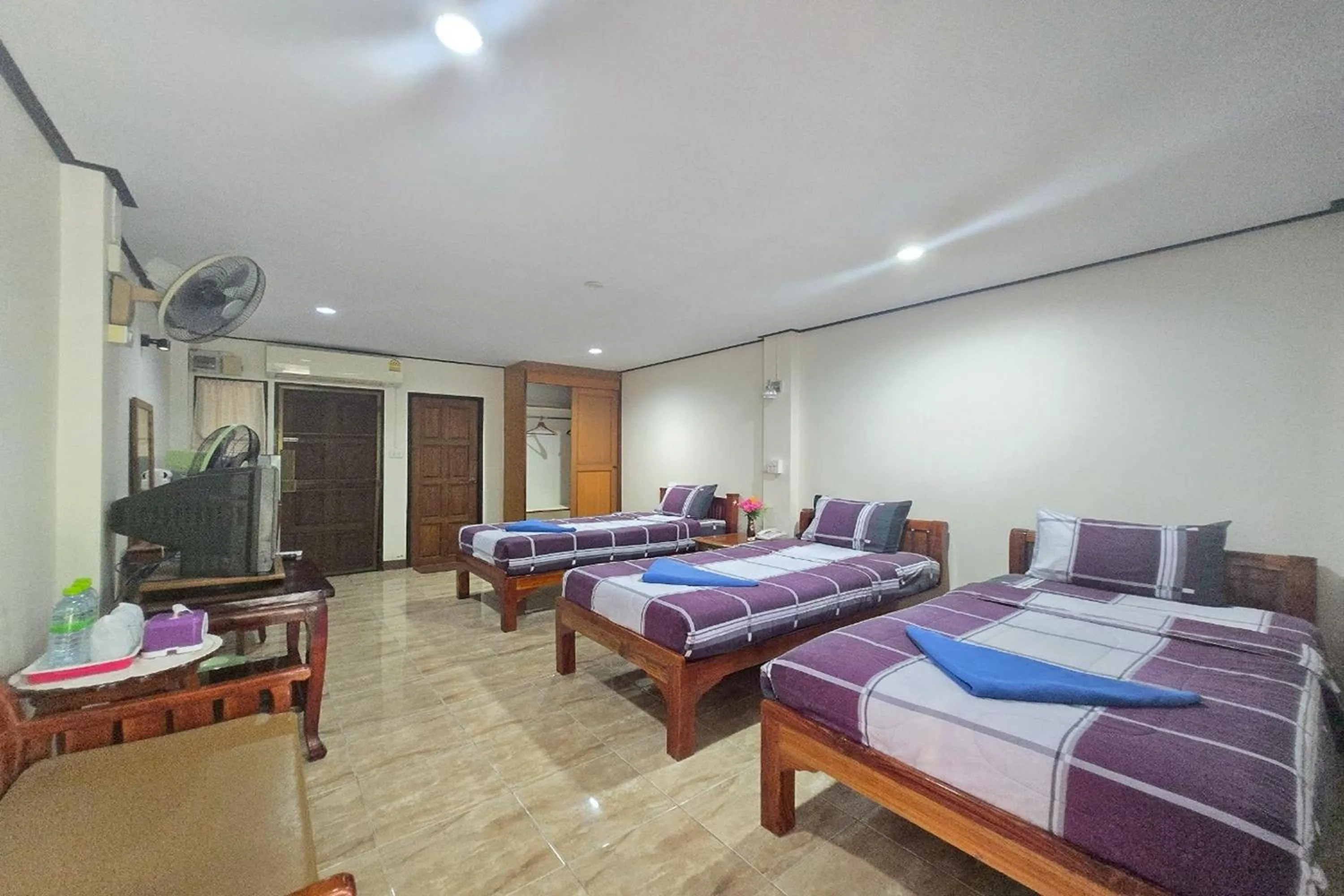 Bed in Phaiboon Hotel & Resort