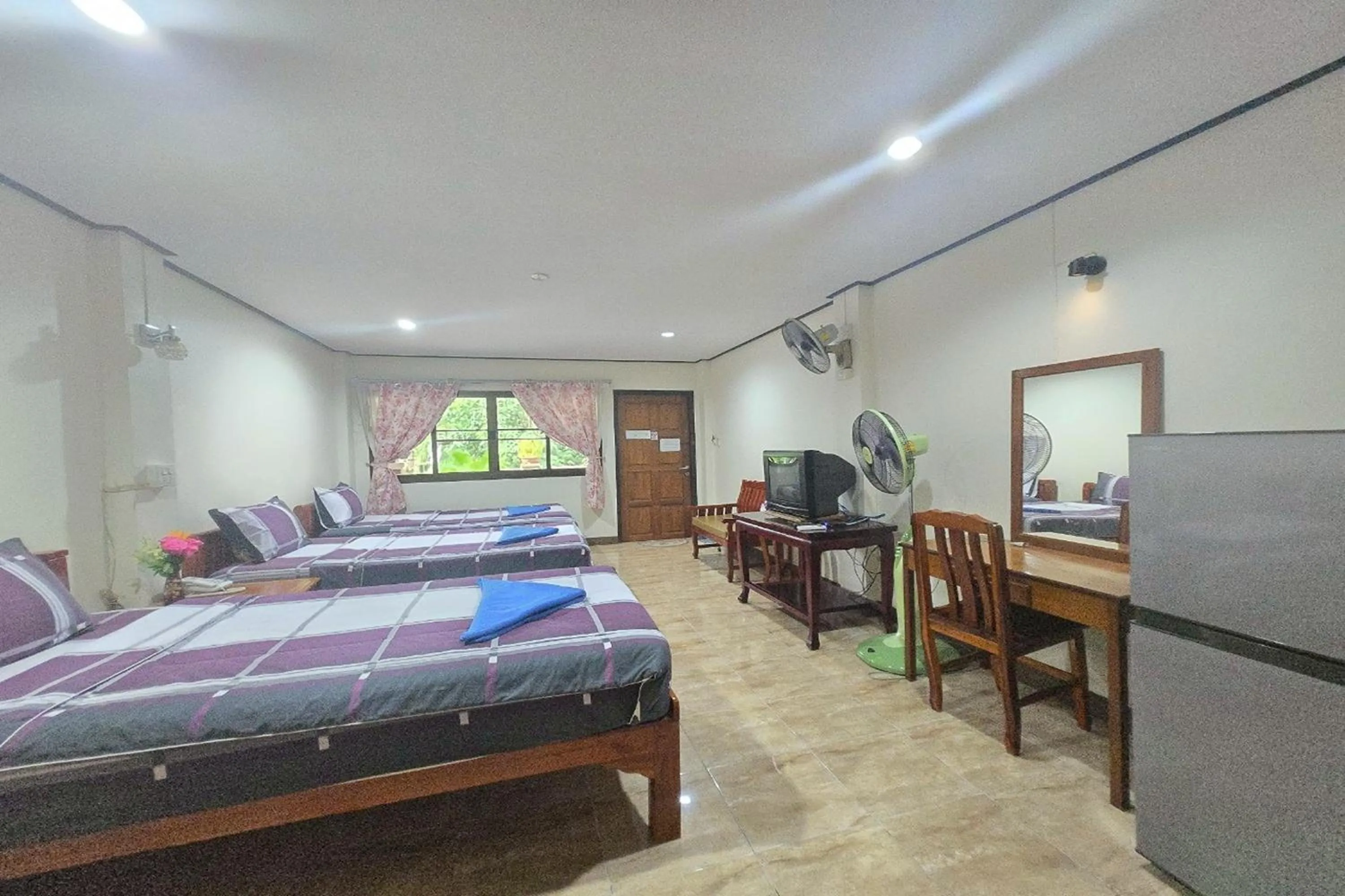 Bed in Phaiboon Hotel & Resort