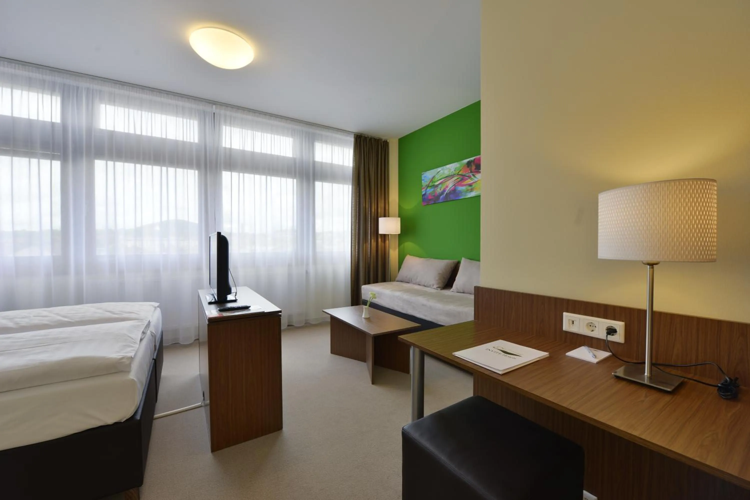 Photo of the whole room, Bed in INVITE Hotel Fulda City Hauptbahnhof