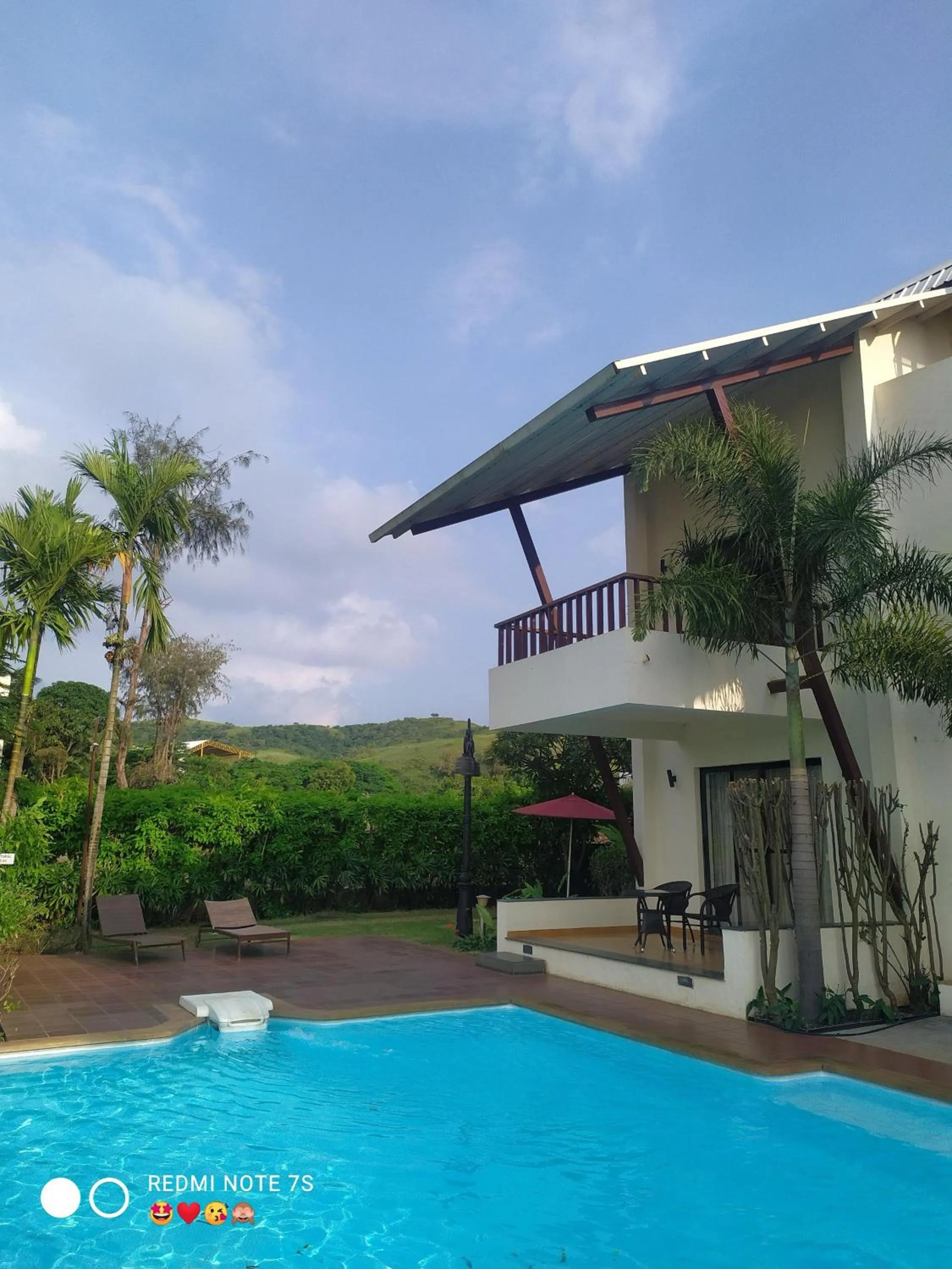 Swimming pool in Regenta Resort Soma Vine Village Nashik