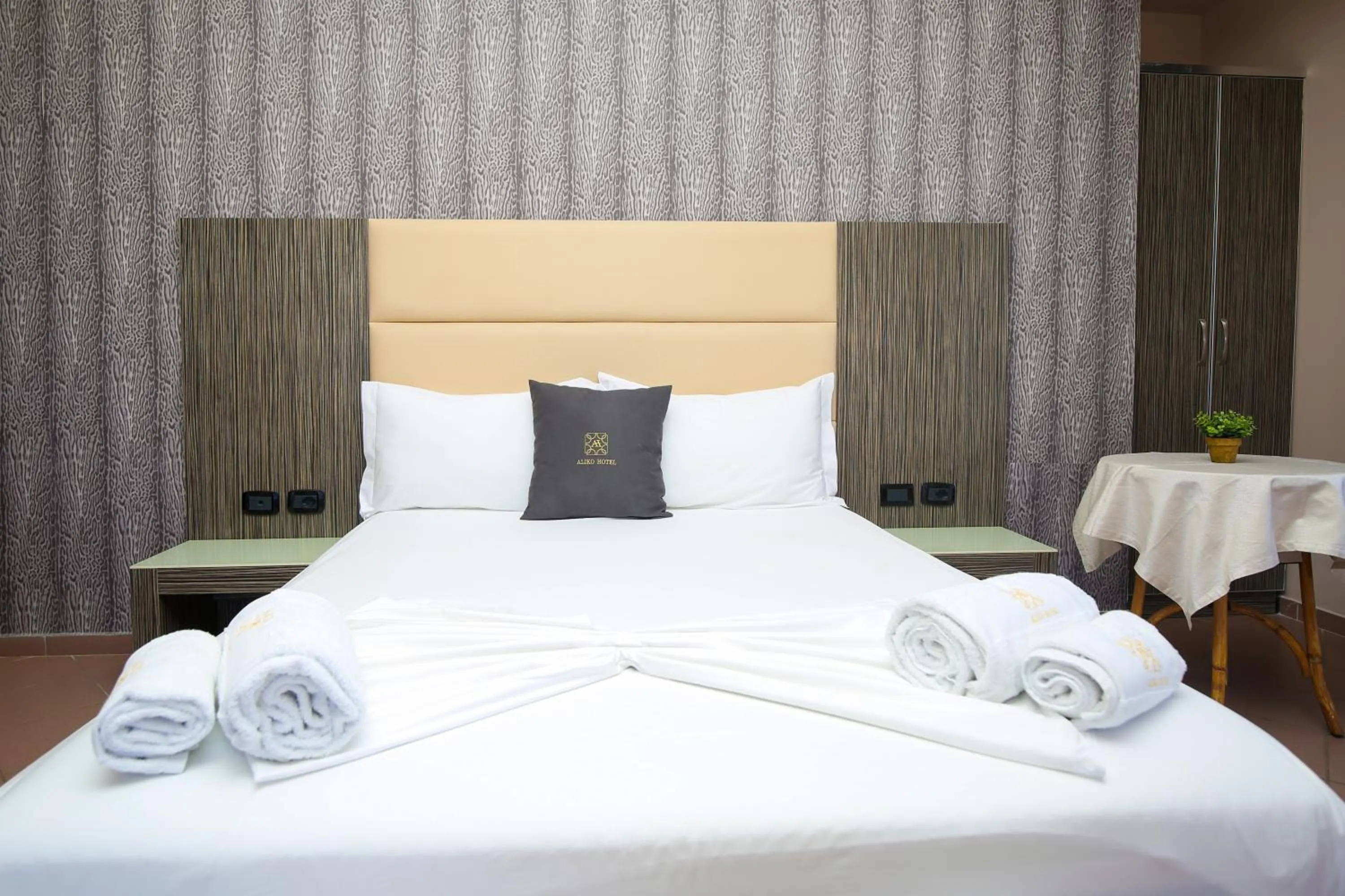 Bed in Aliko Hotel