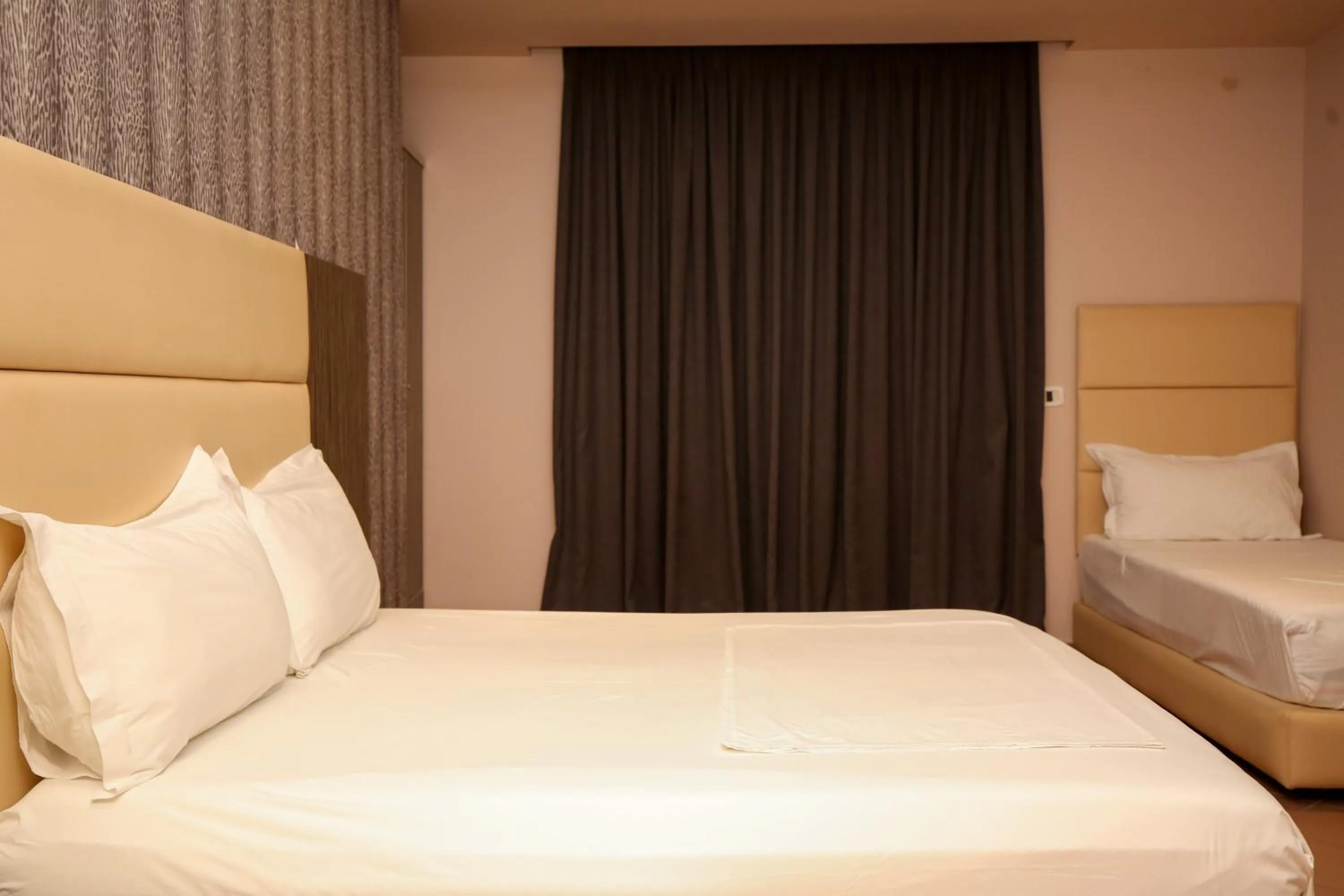 Bedroom in Aliko Hotel