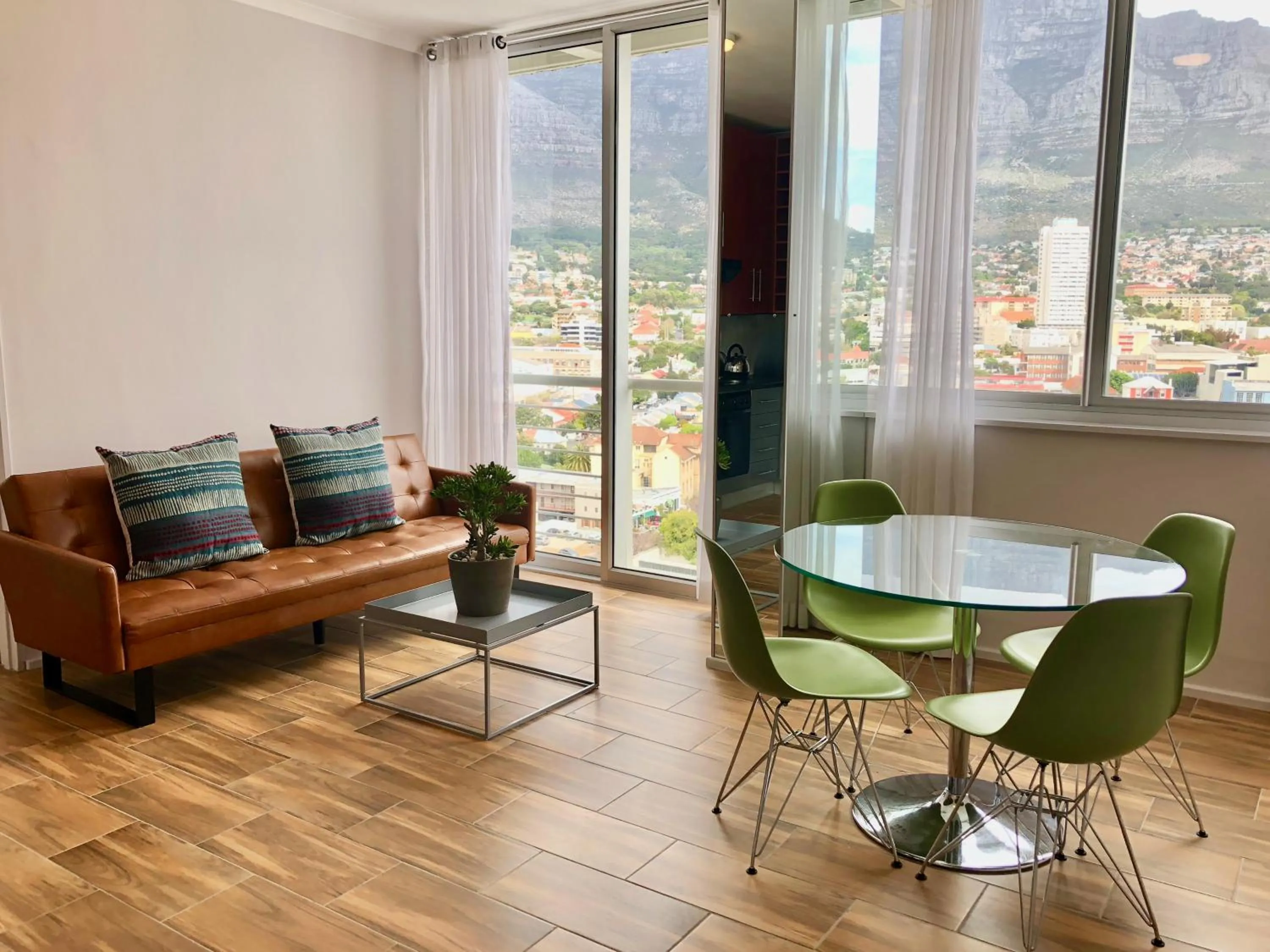 Living room in Urban Oasis at Perspectives