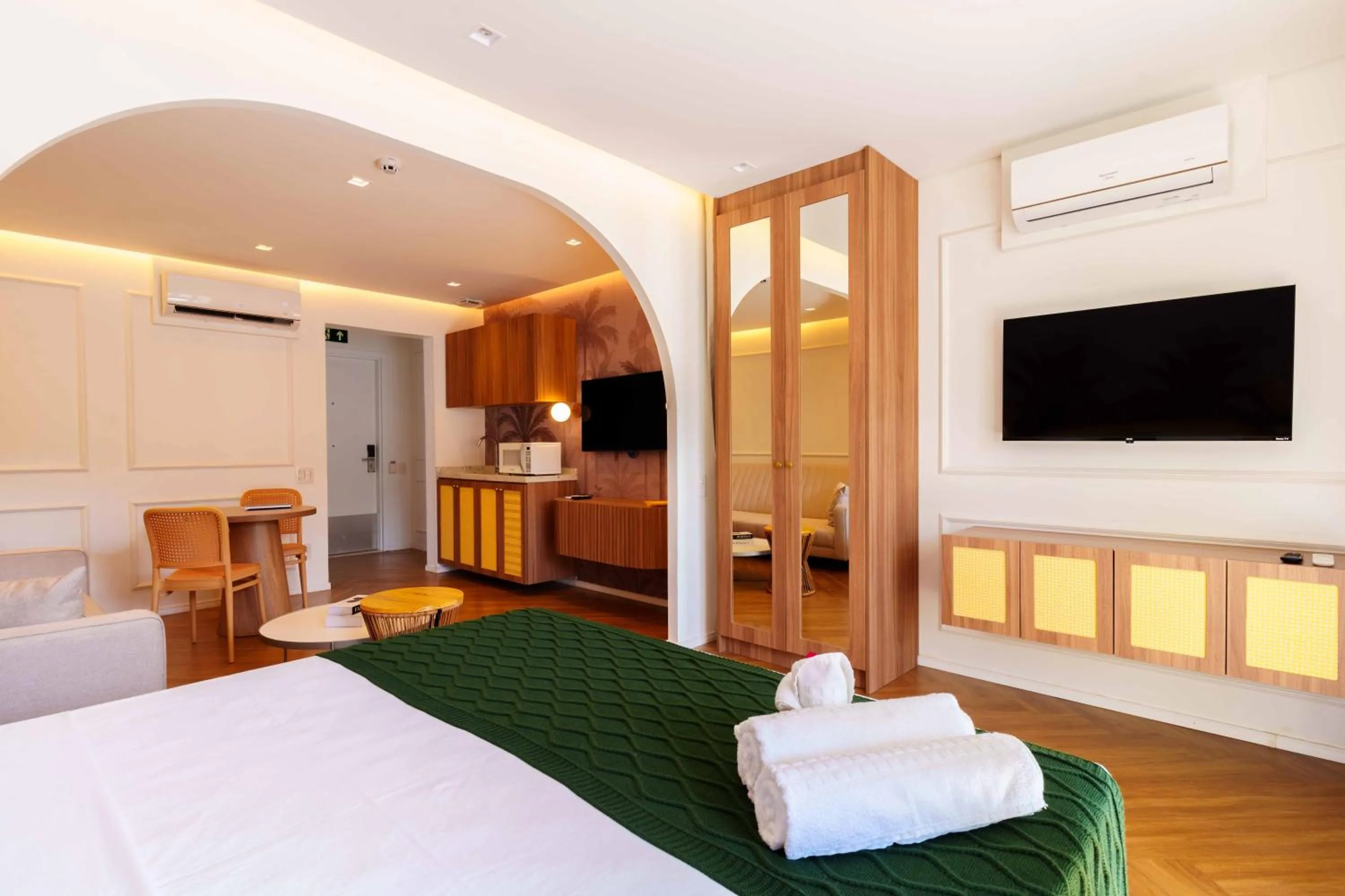 Living room, Bed in Santé Vivre L'Experience by Livá OFICIAL