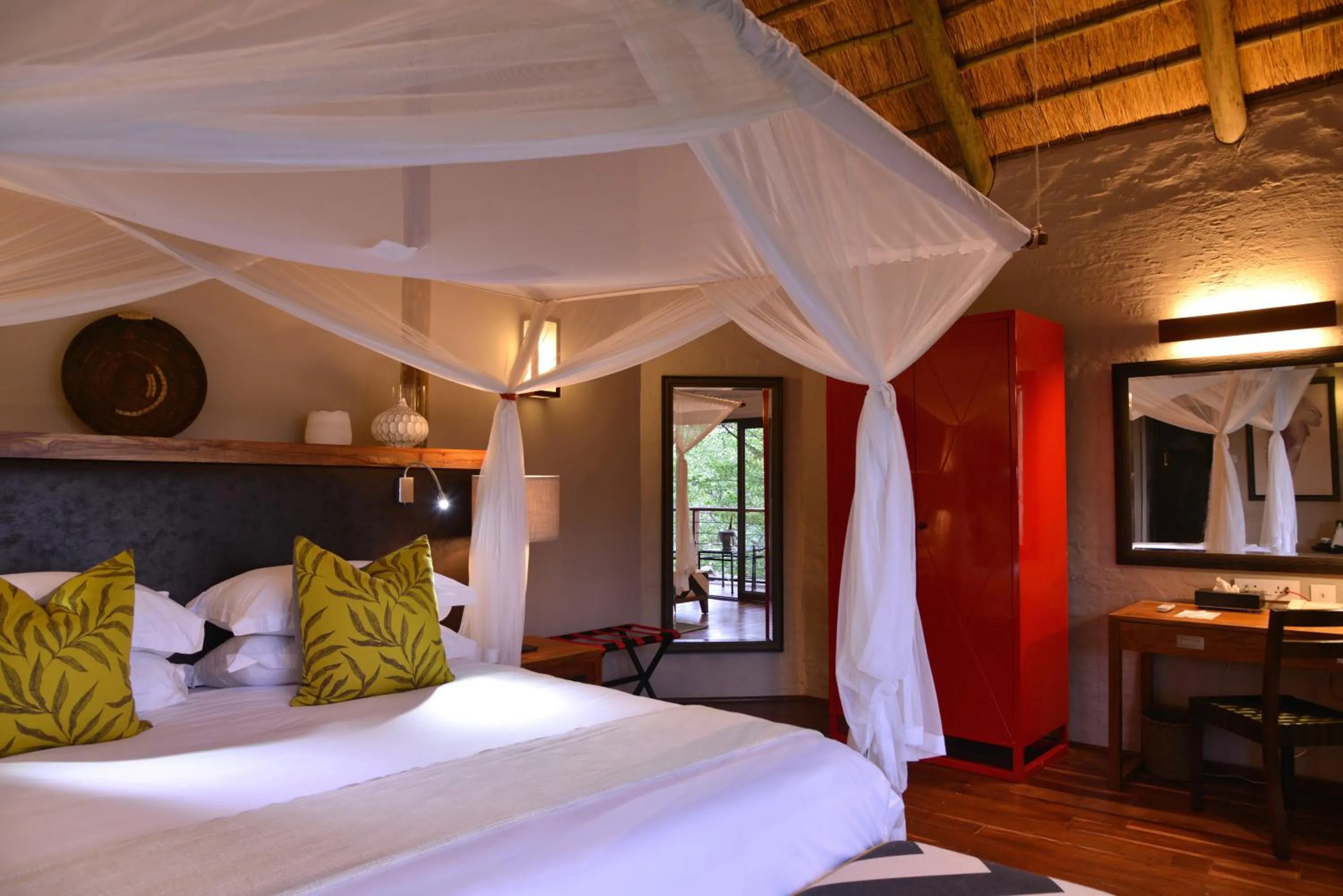 Bed in Victoria Falls Safari Suites