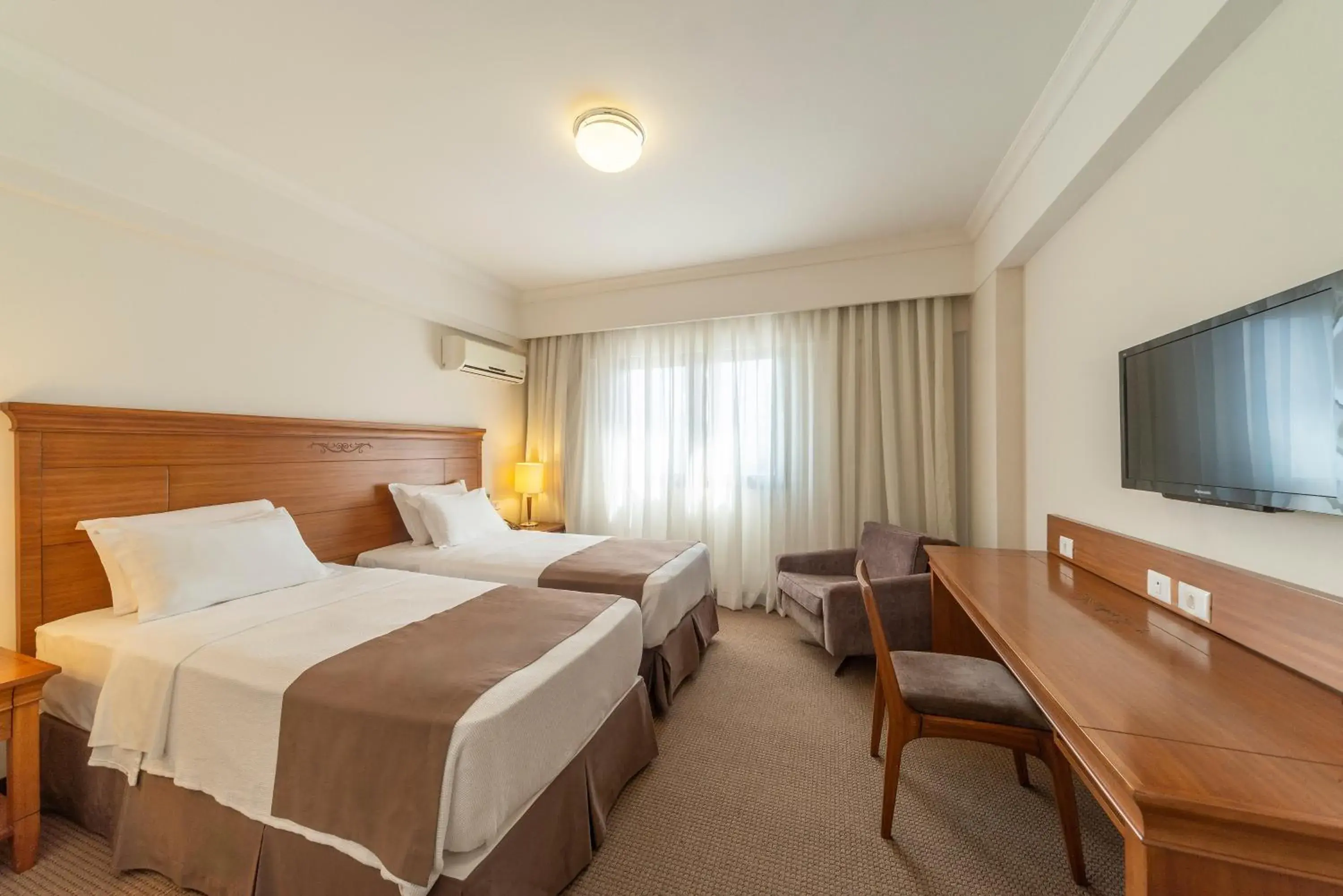 Twin Room - single occupancy in Hotel Laghetto Villa Moura Twin Room - single occupancy in Hotel Laghetto Villa Moura