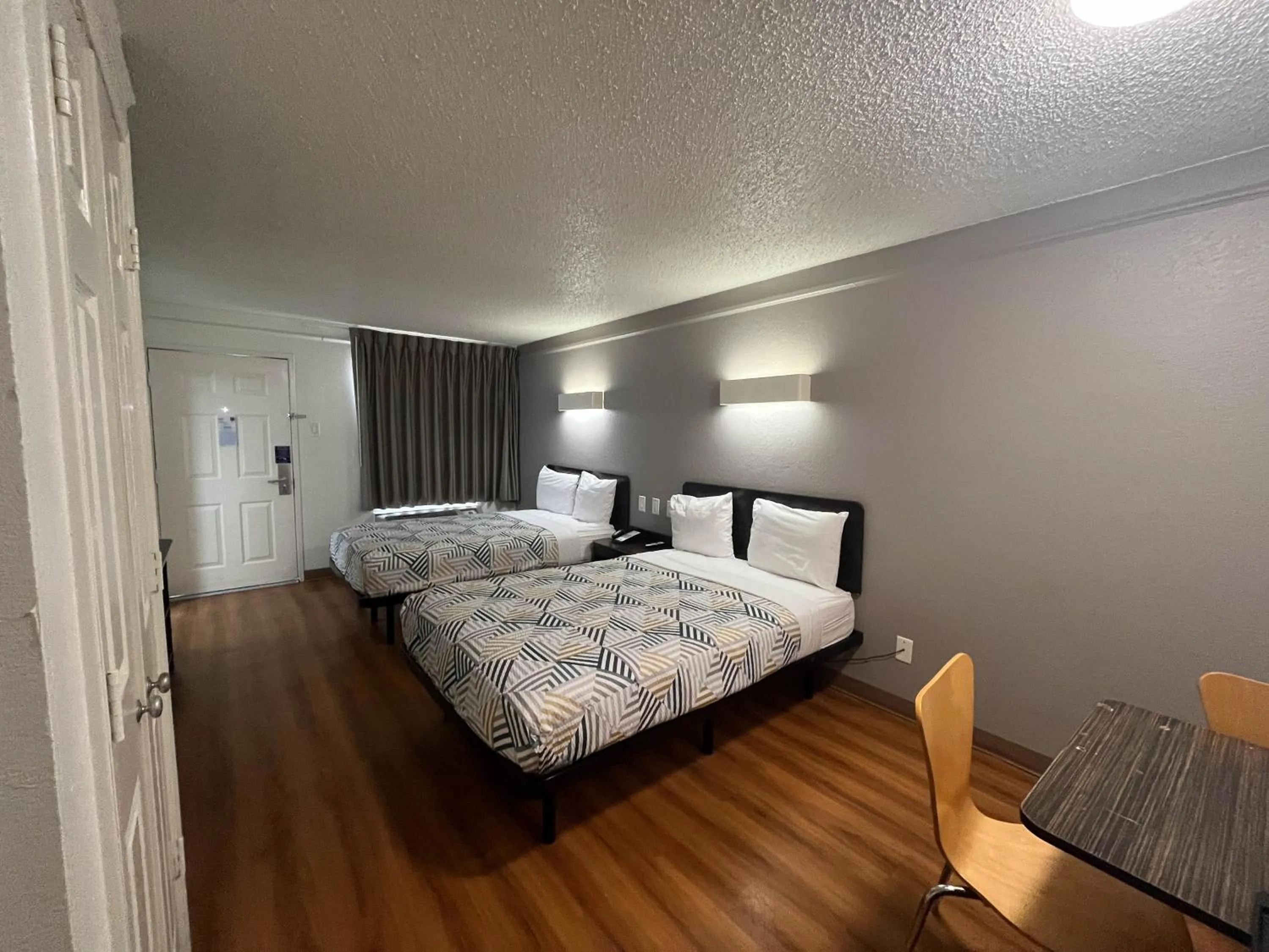 Bed in Studio 6 Suites Euless, TX – DFW West