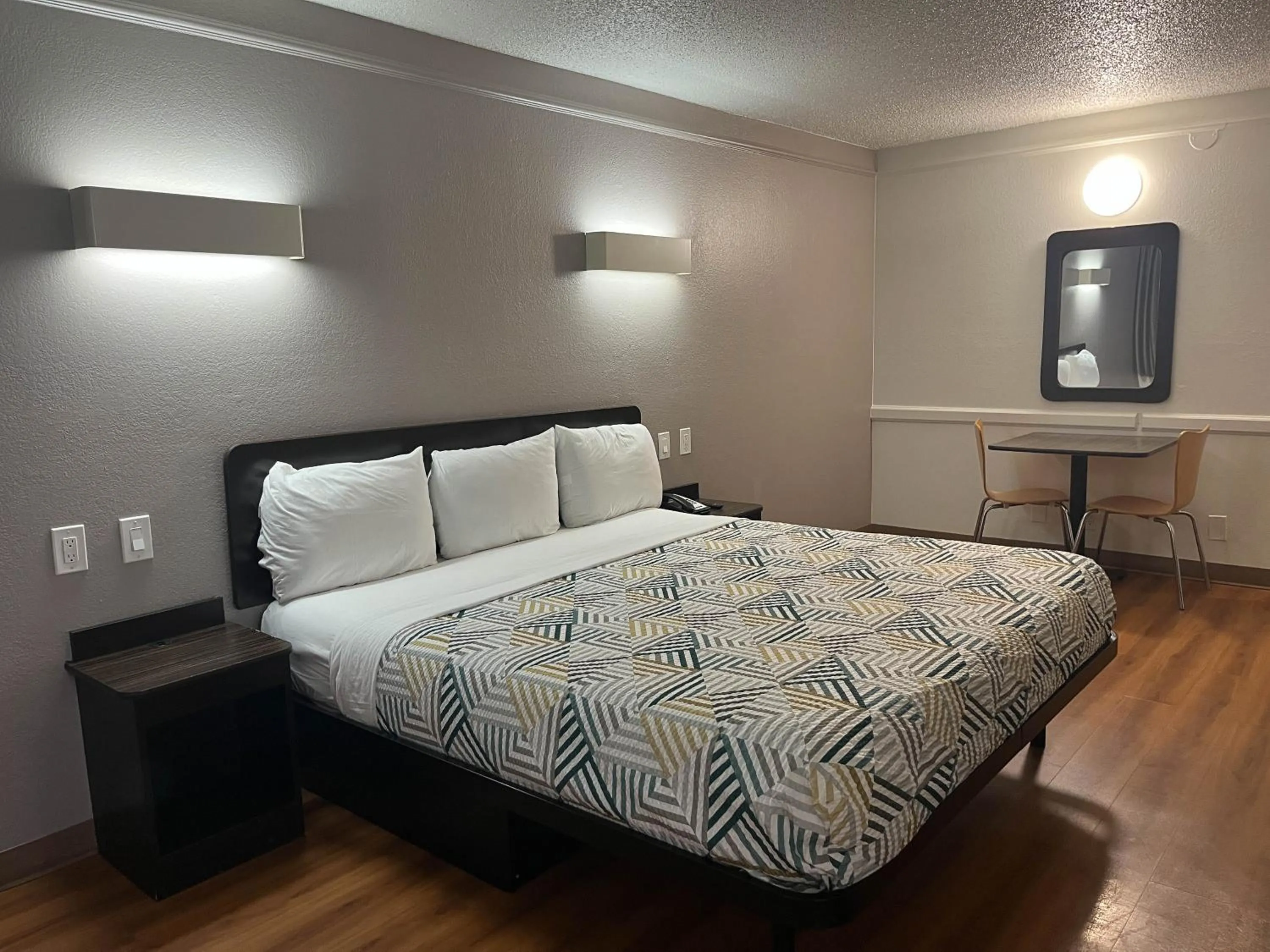 Bed in Studio 6 Suites Euless, TX – DFW West