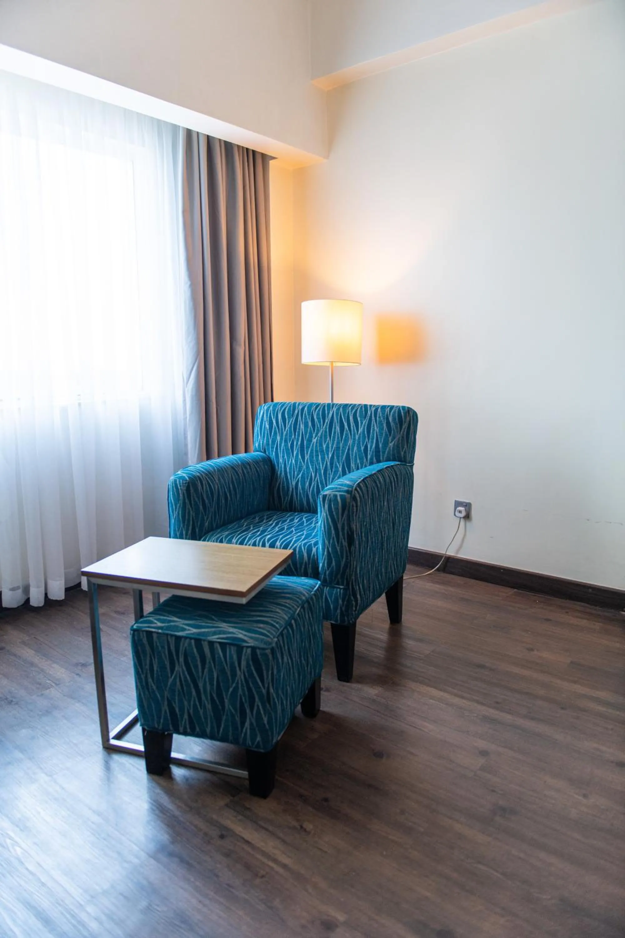 Seating area in Acacia Premier Hotel