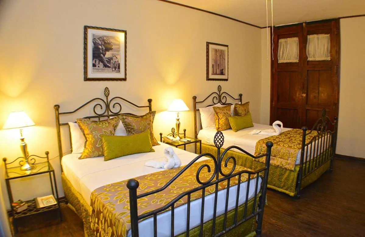 Photo of the whole room, Bed in Hotel Los Balcones Leon