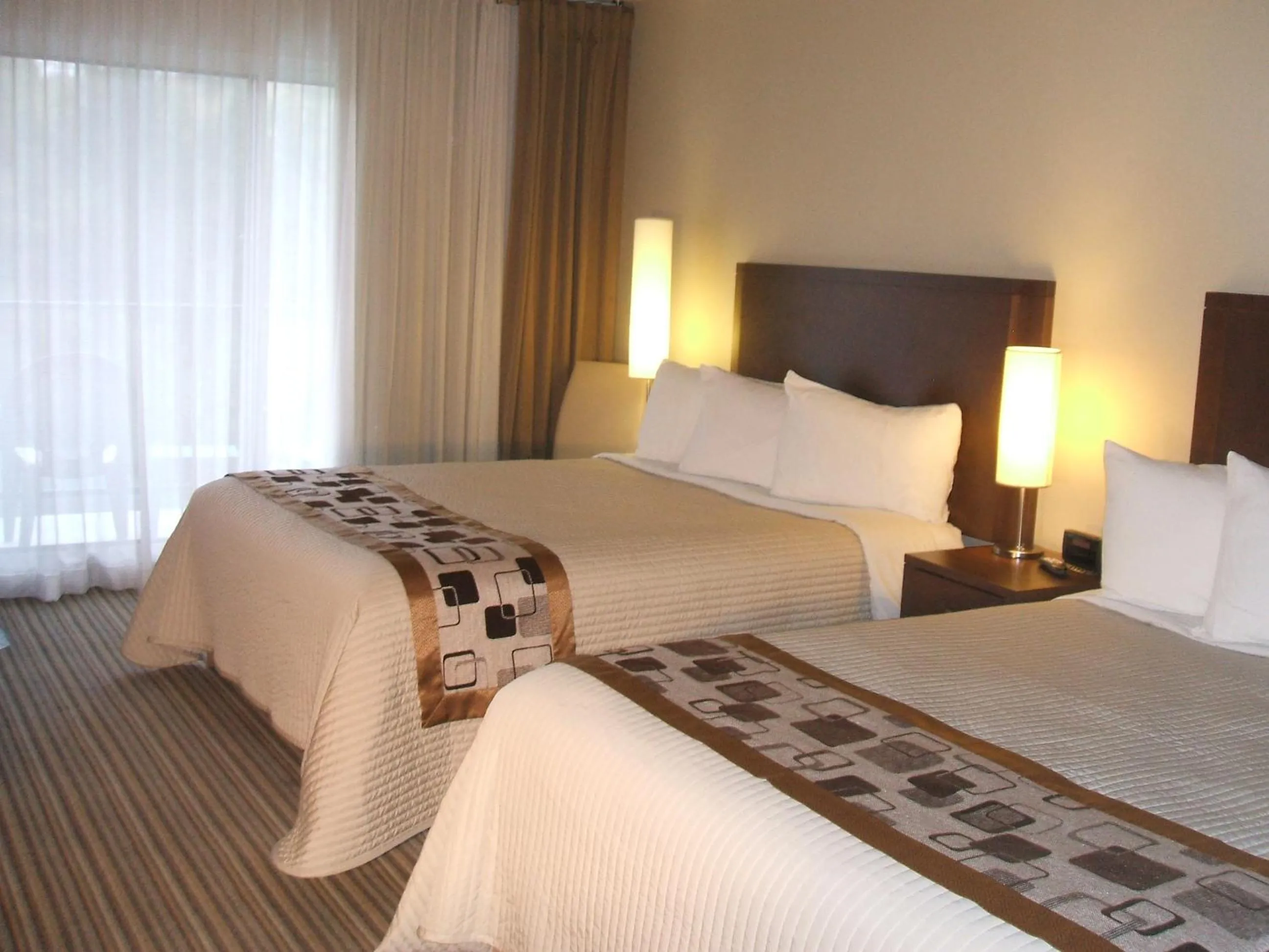 Bed in Excelsior Hôtel Spa Sainte-Adèle