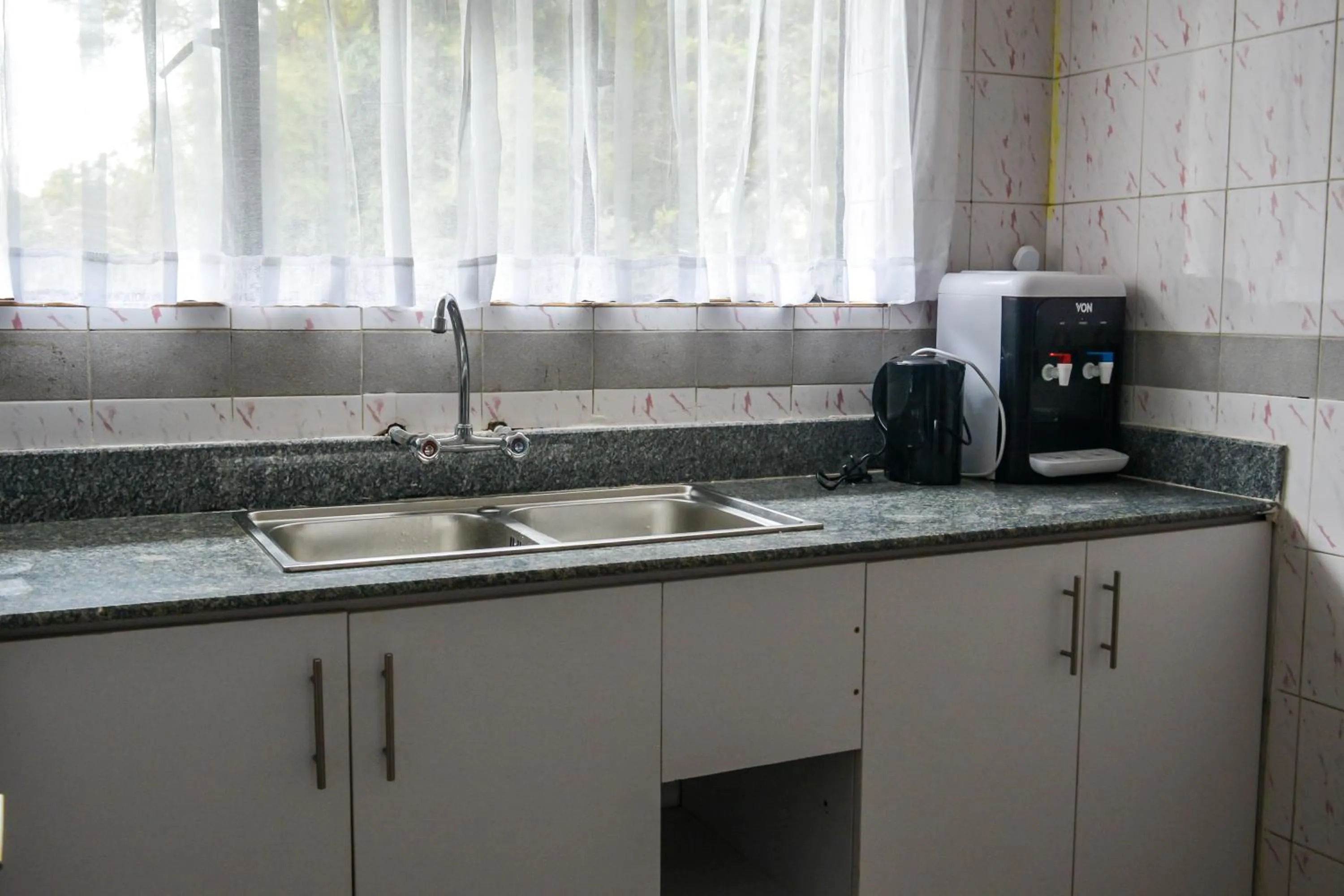 Kitchen or kitchenette in Brickwood Apartments