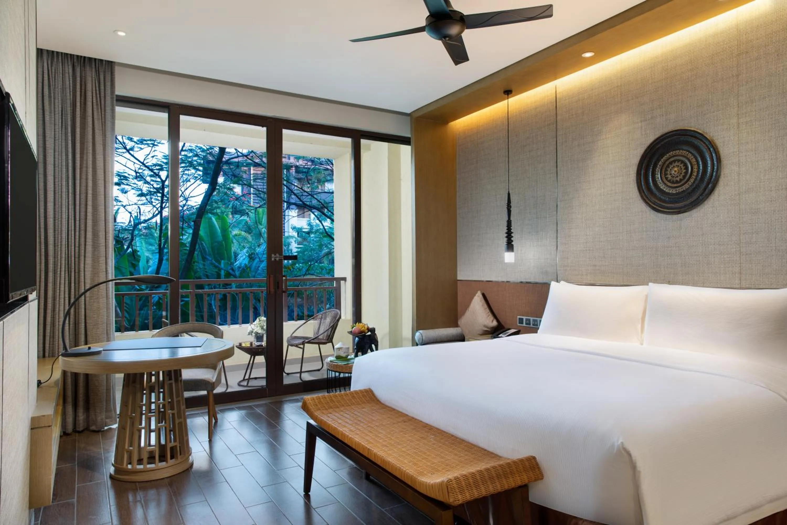 Photo of the whole room, Bed in Pullman Resort Xishuangbanna