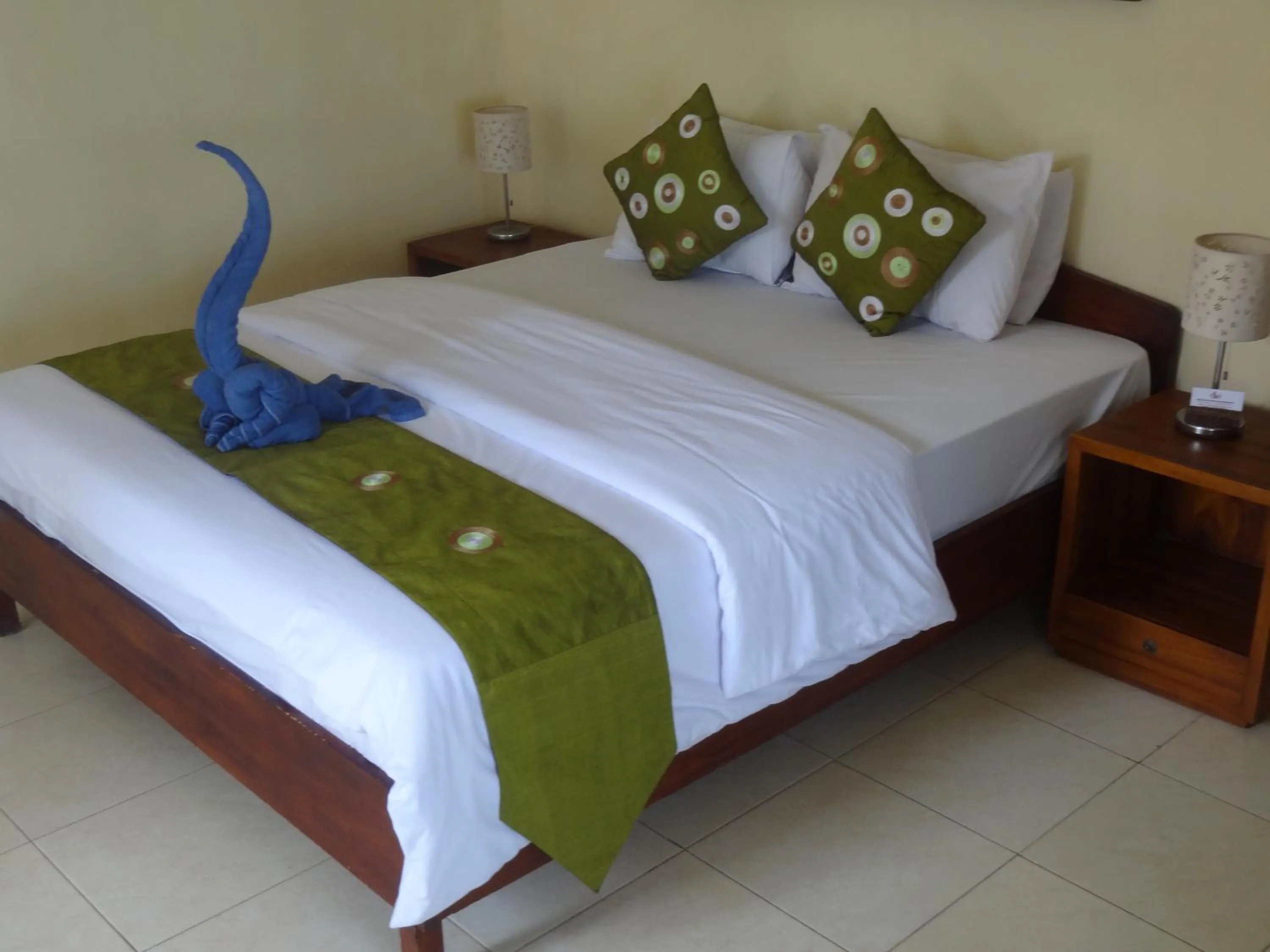 Bed in Segara Wangi Beach Cottages