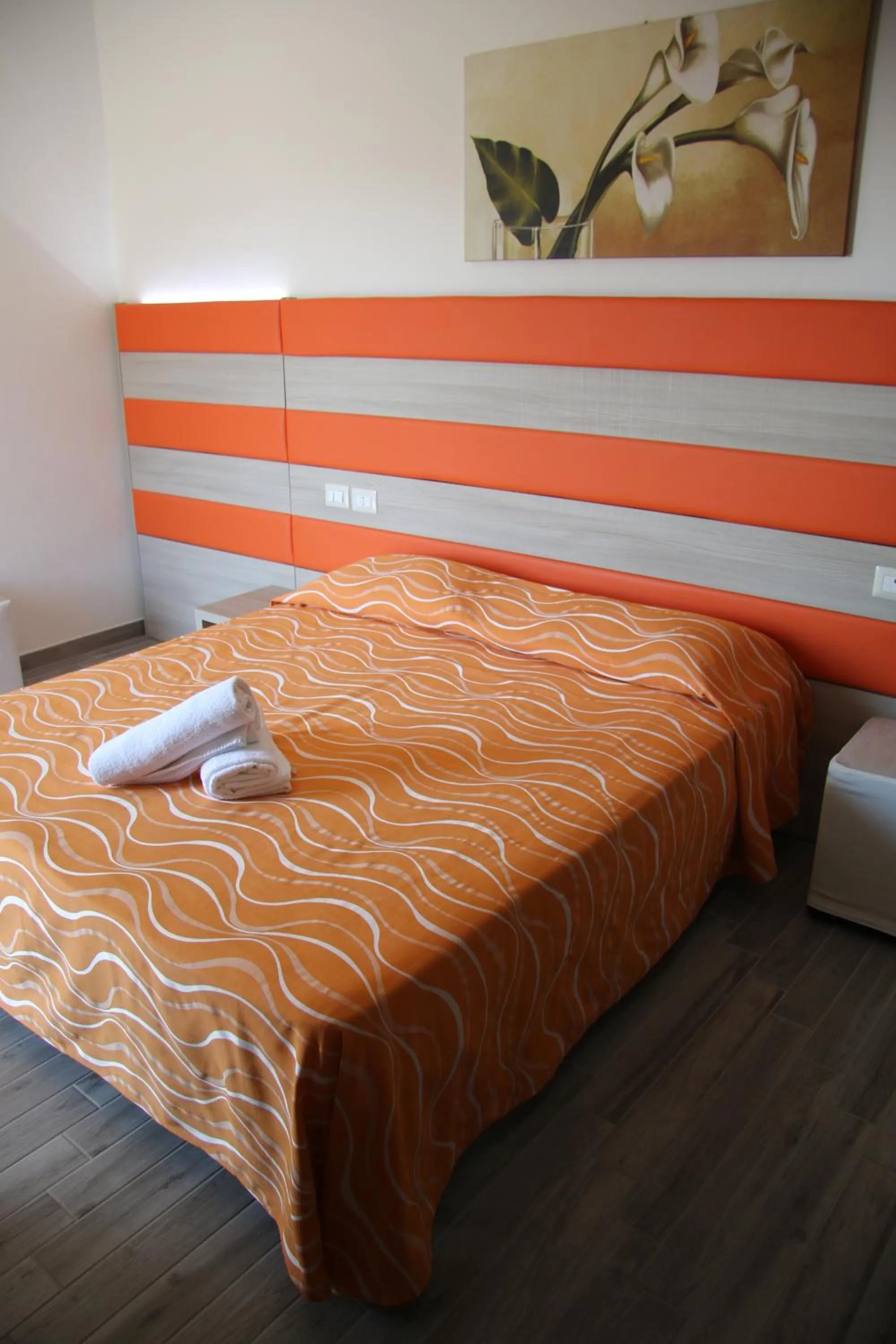 Bed in ChrisMare Hotel