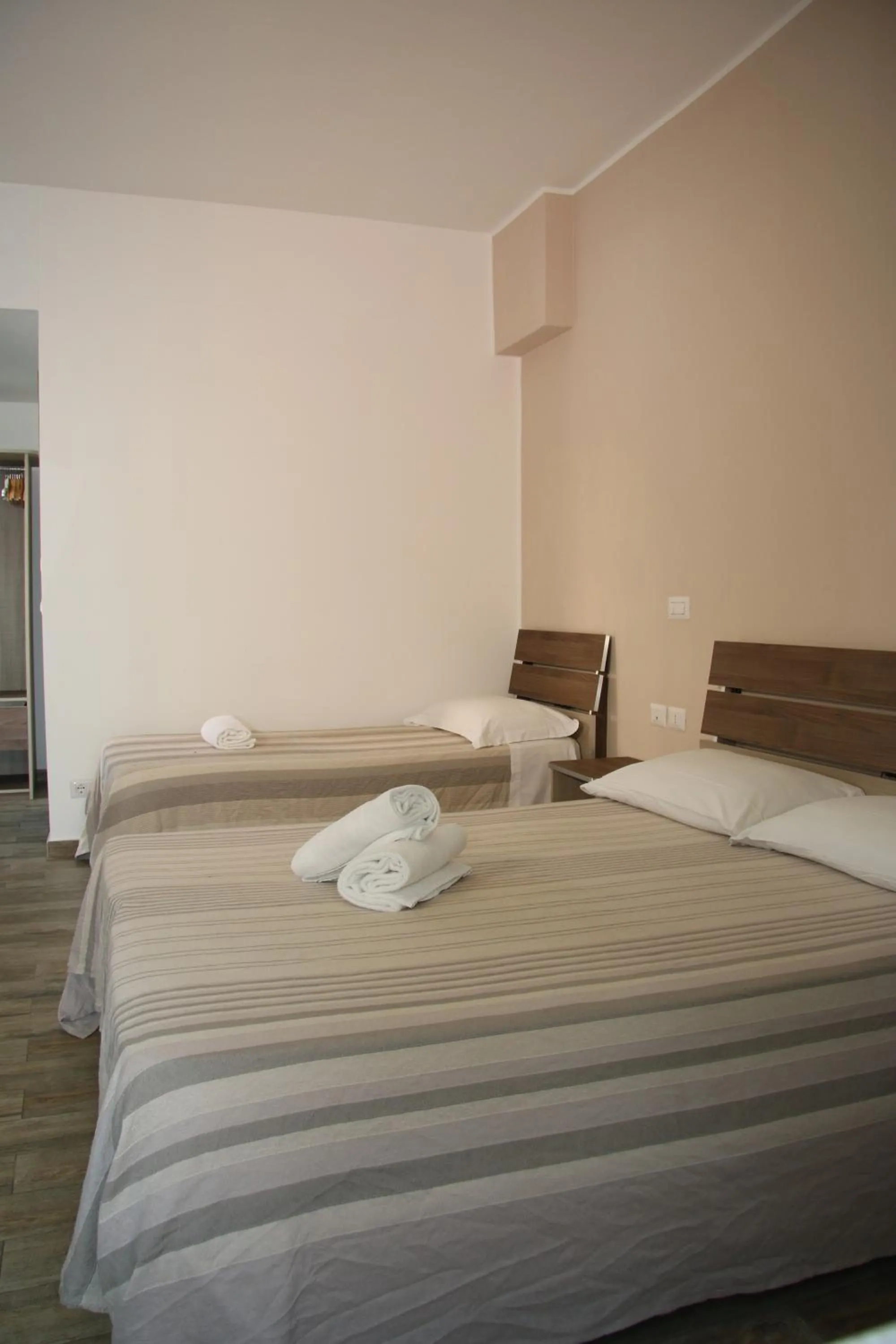 Bed in ChrisMare Hotel