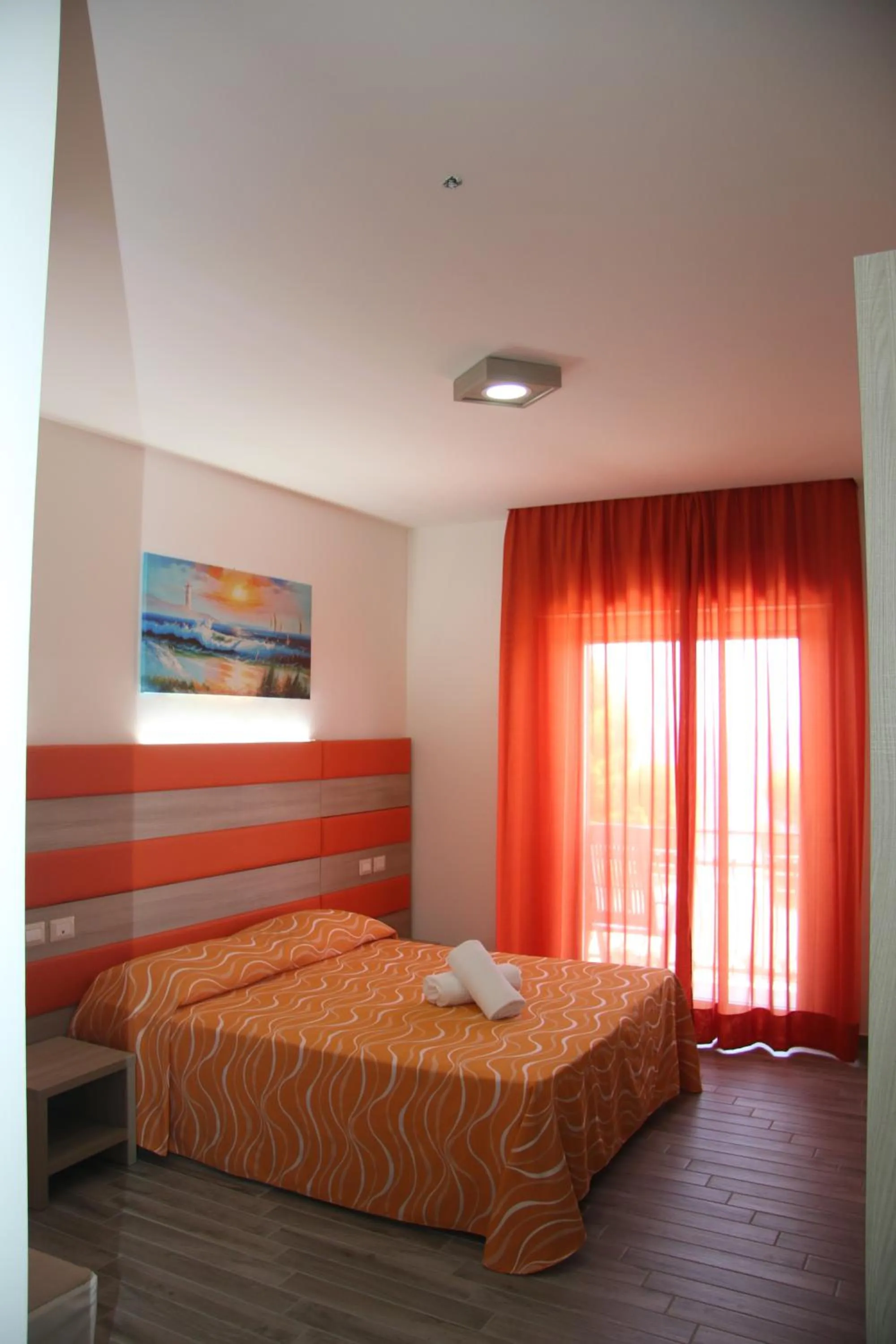 Bed in ChrisMare Hotel