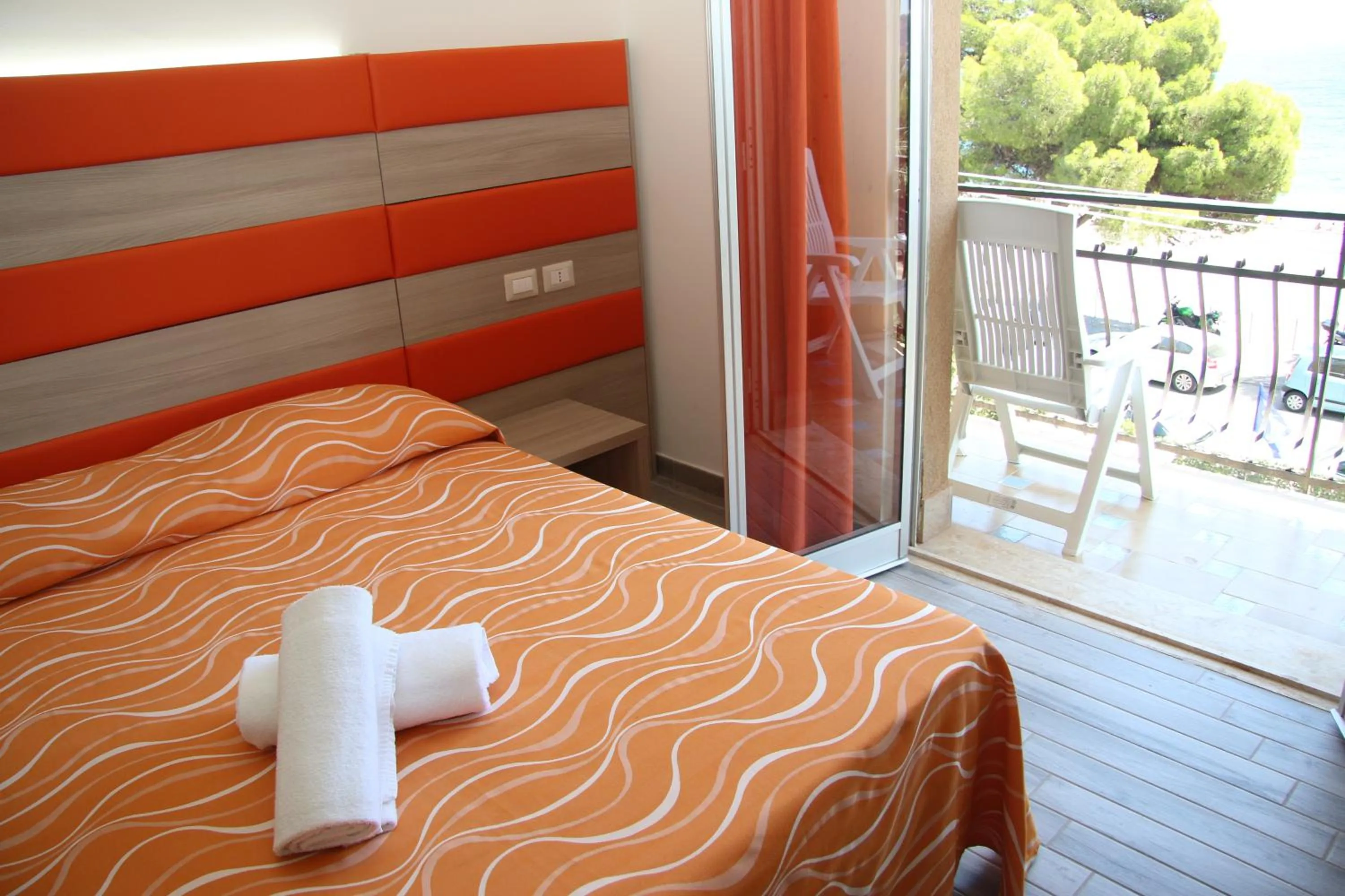 Bed in ChrisMare Hotel