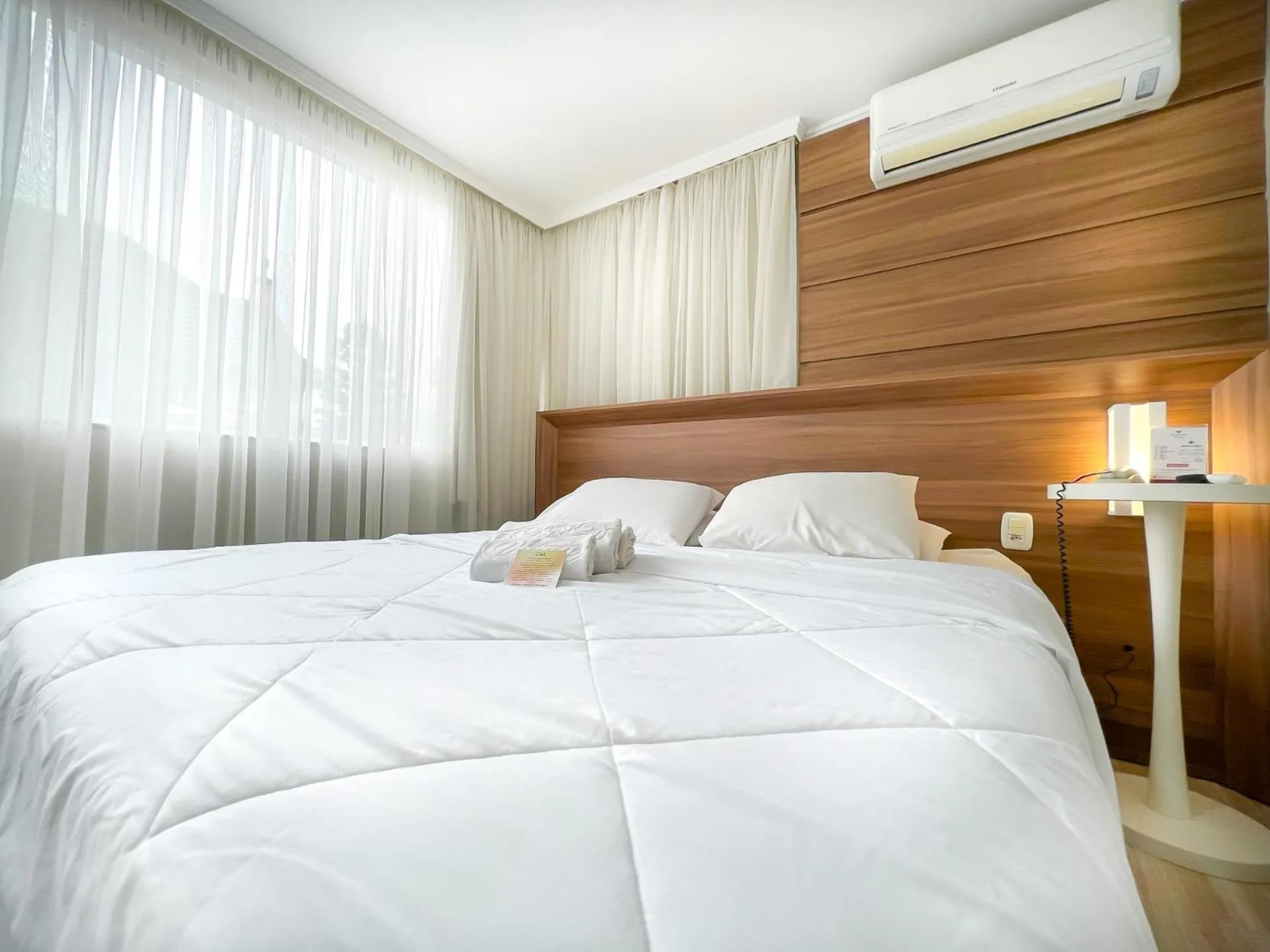 Bed in Pousada Viena