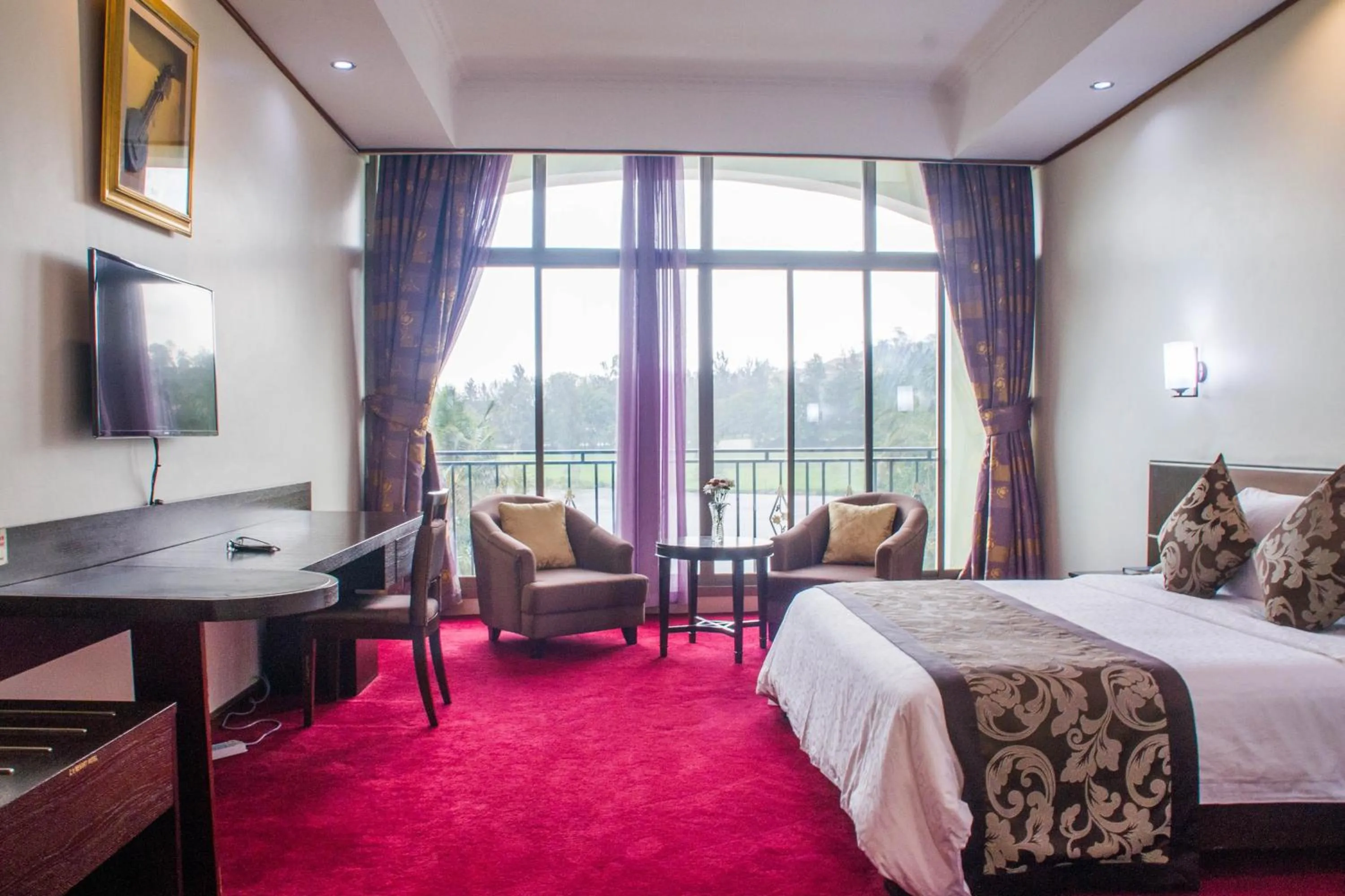 Bed in Lake View Resort Hotel