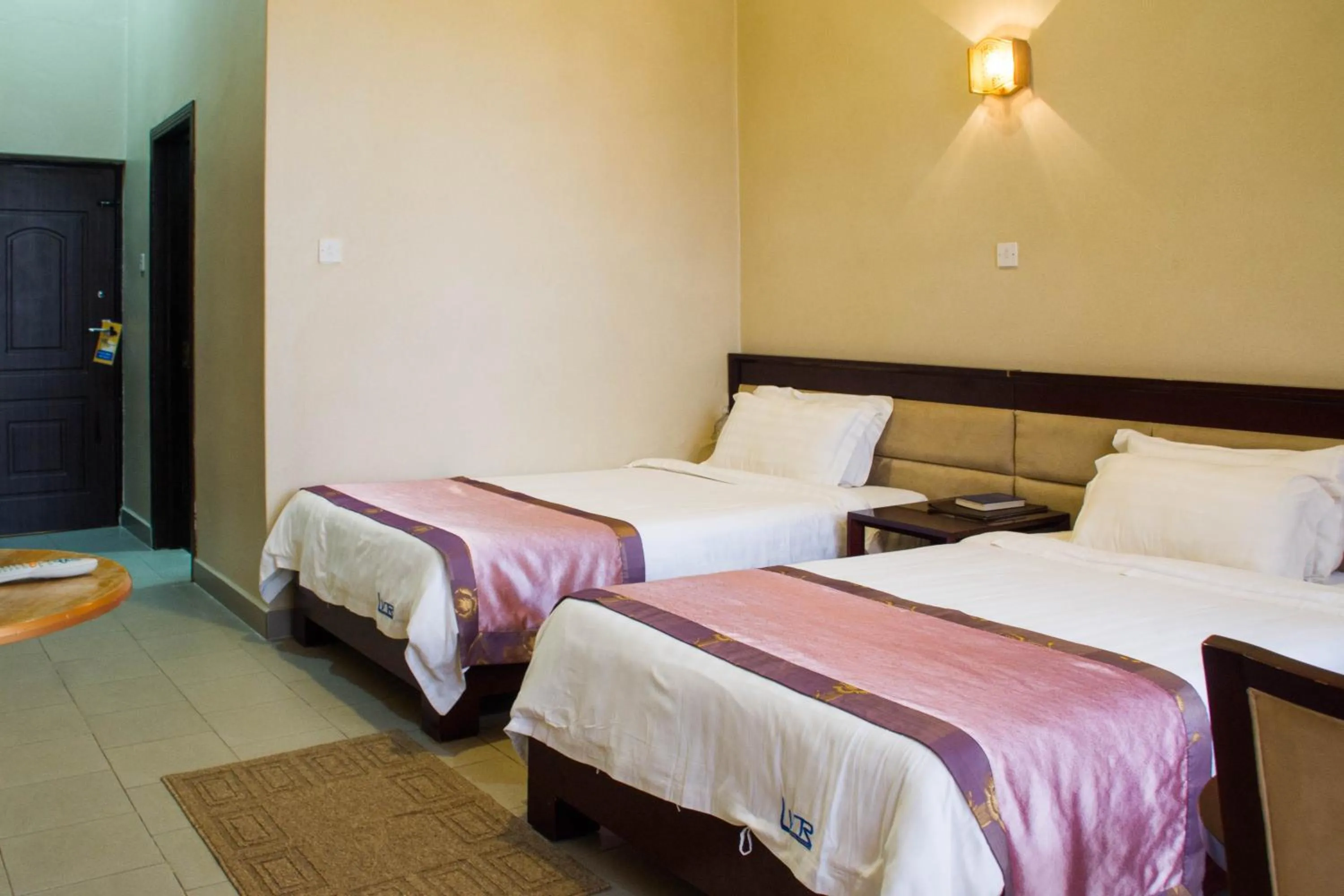 Bed in Lake View Resort Hotel