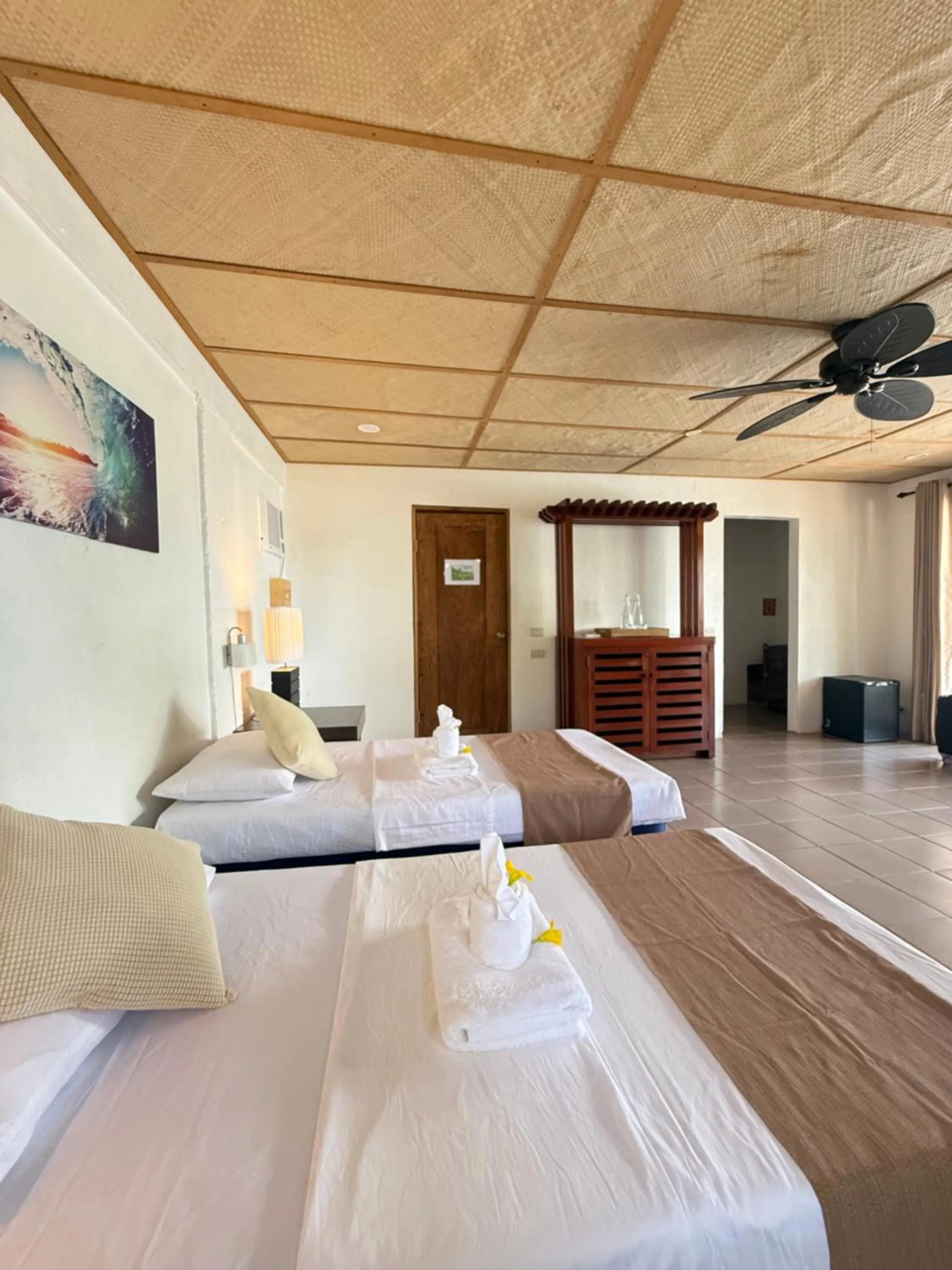 Bed in Chindonan Dive and Beach Resort