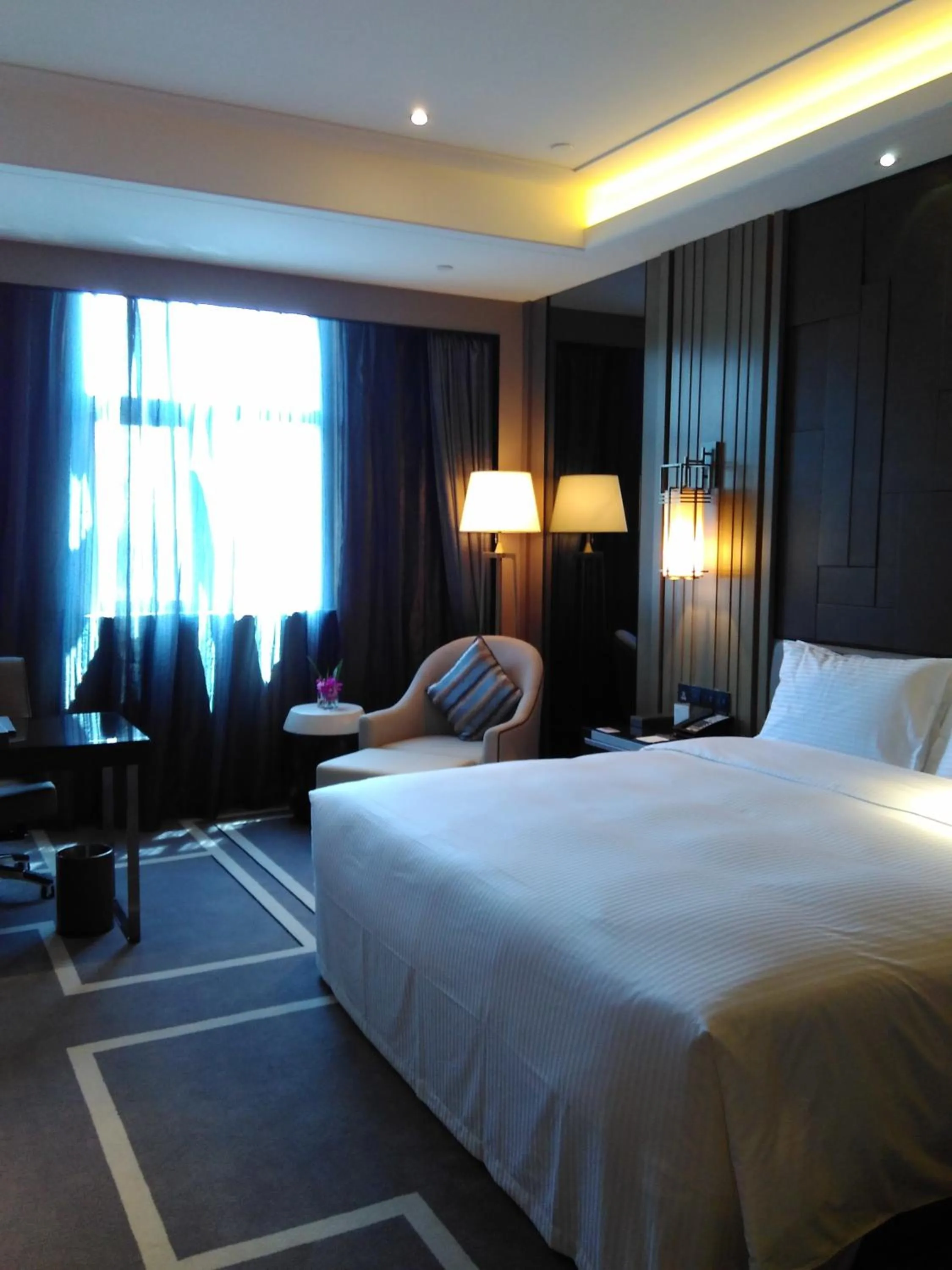 Photo of the whole room, Bed in Wanda Realm Hotel Dongying