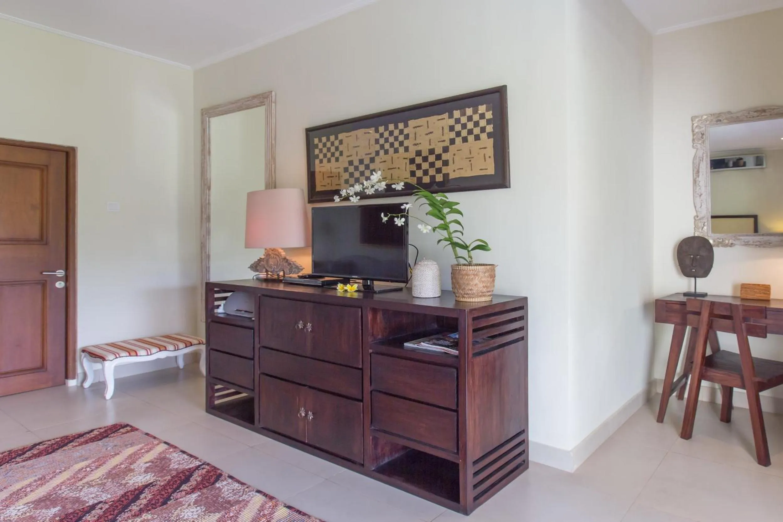 Communal lounge/ TV room in Villa Balidamai by Nagisa Bali