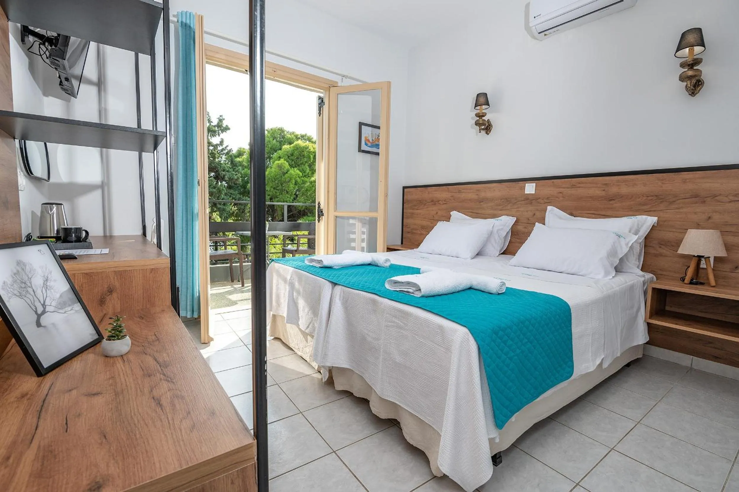 Bed in Genesis Hotel