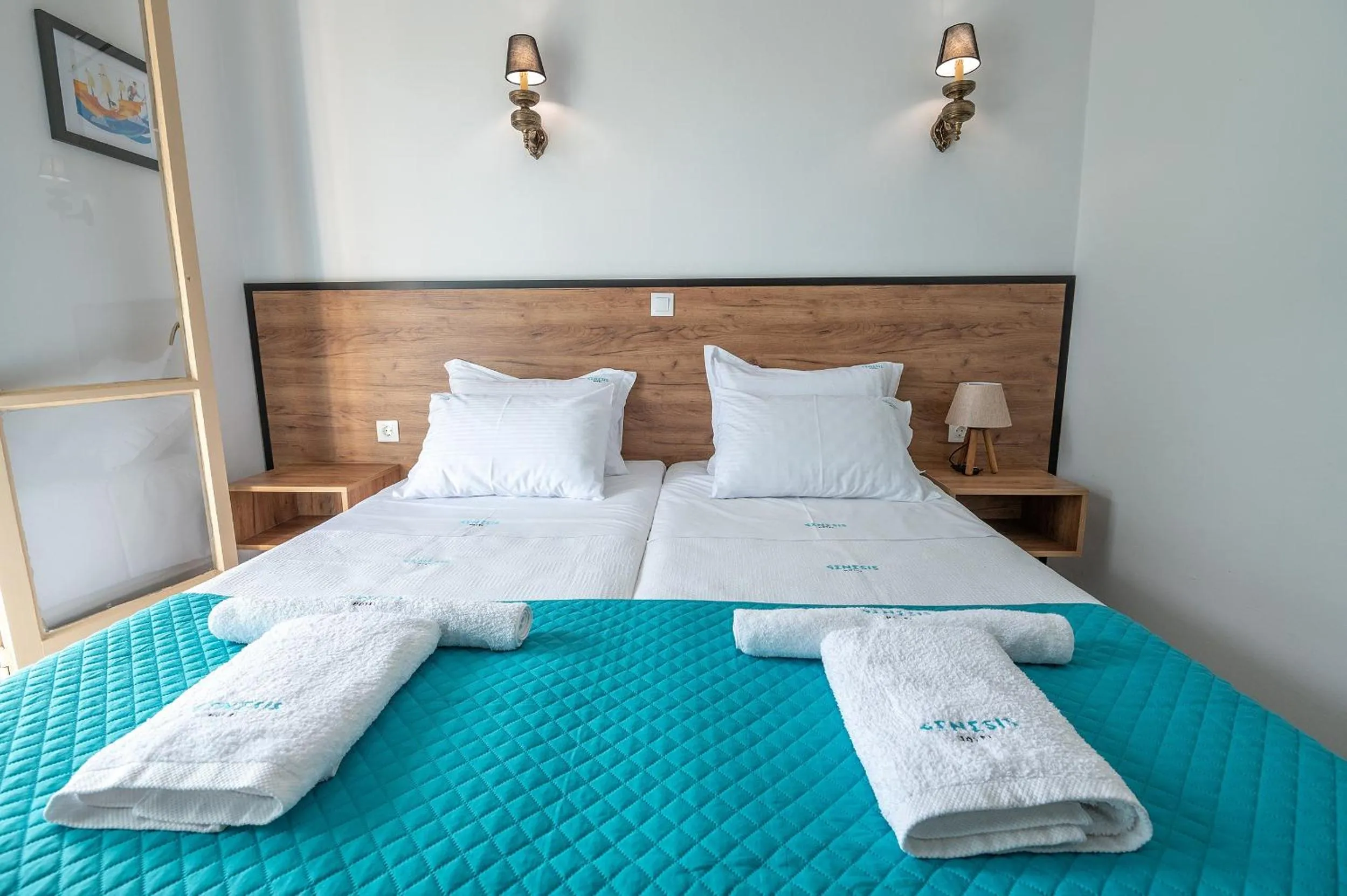 Bed in Genesis Hotel