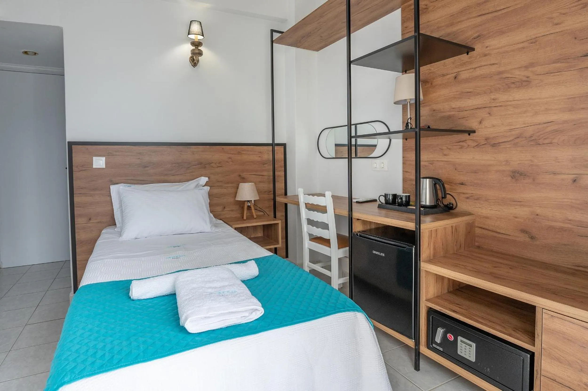 Bed in Genesis Hotel