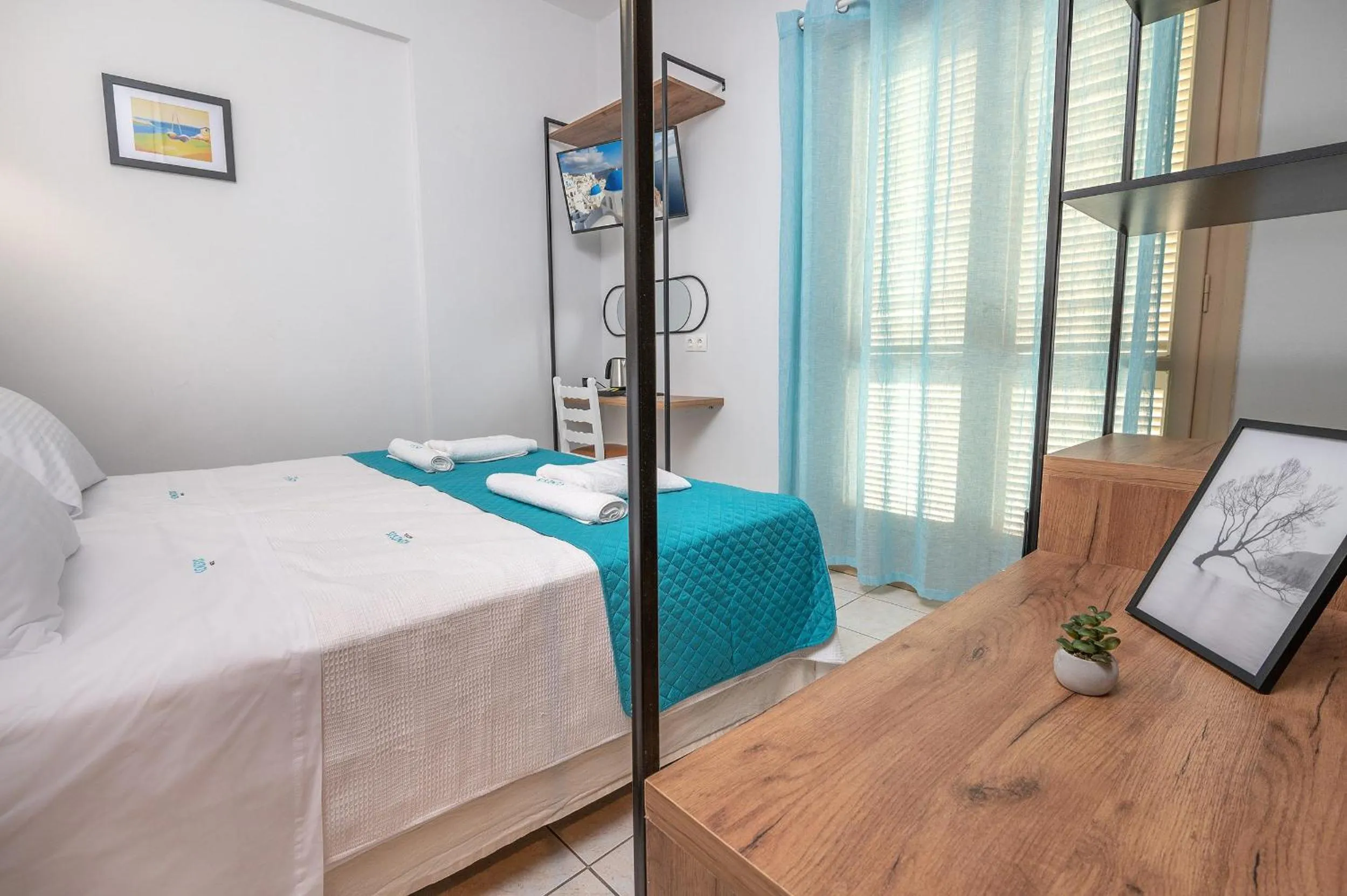 Bed in Genesis Hotel