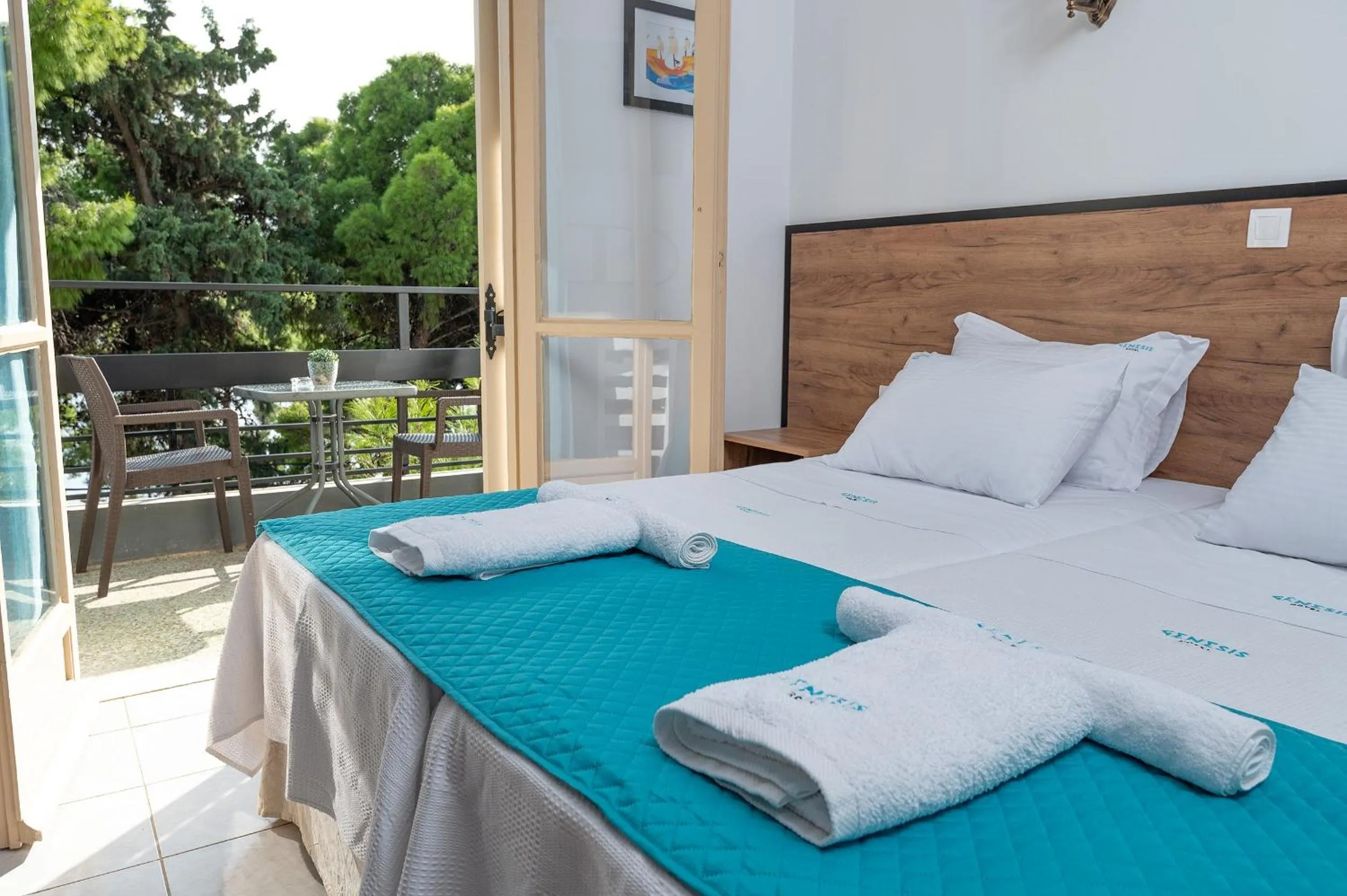 Bed in Genesis Hotel