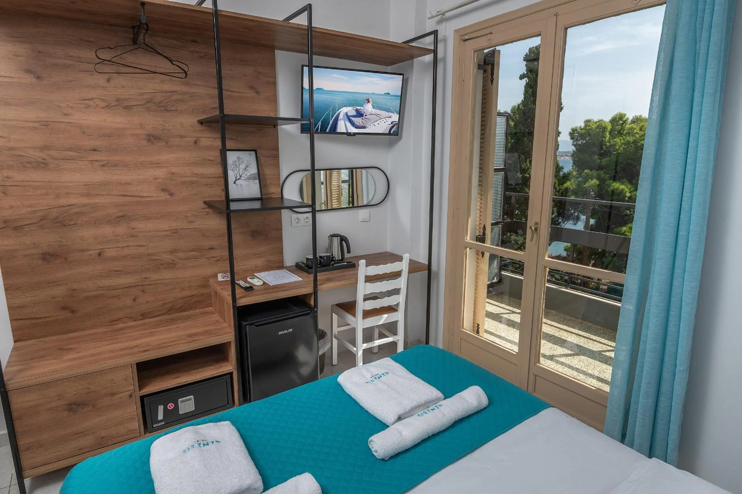 Bed in Genesis Hotel