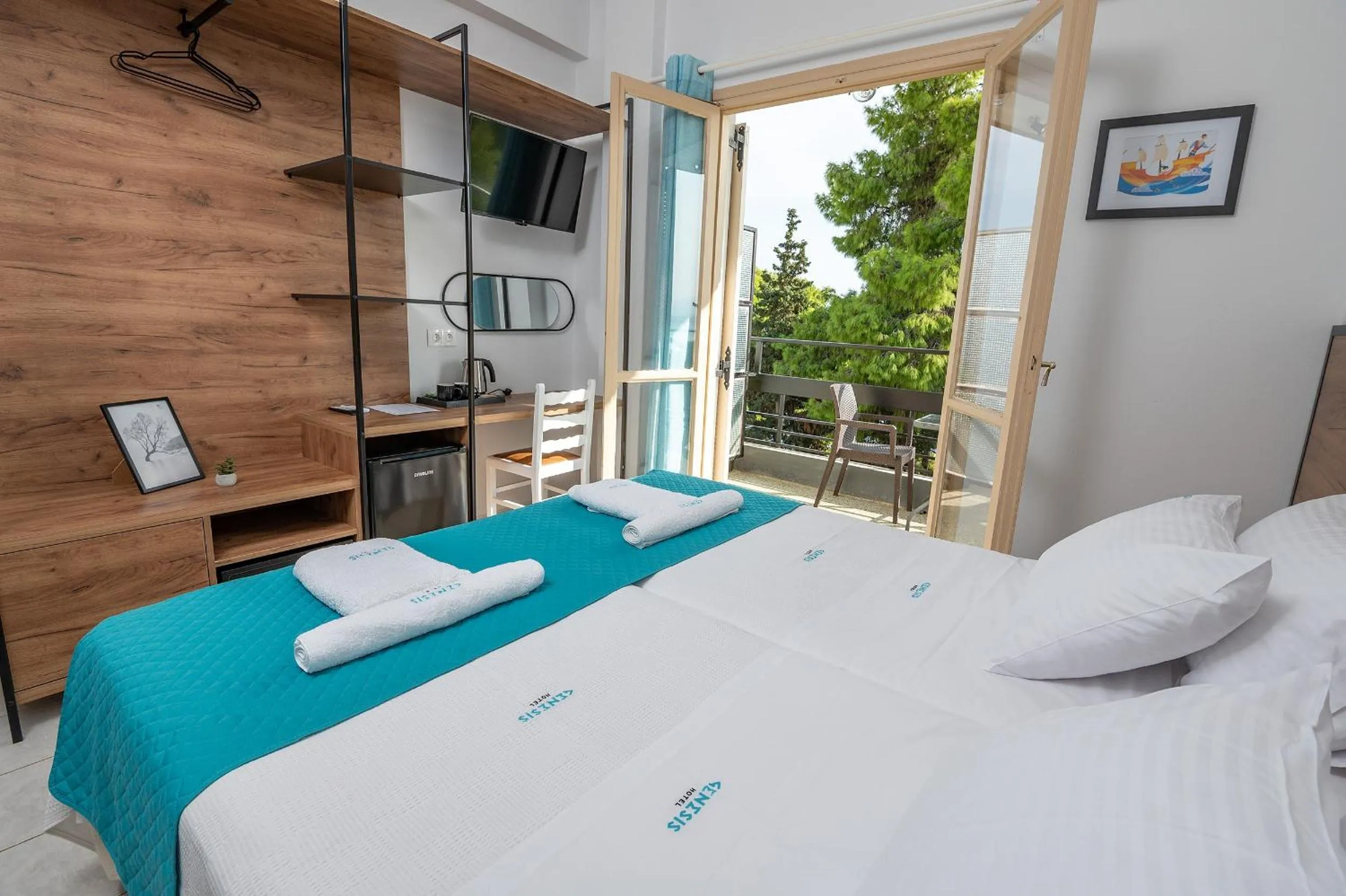 Bed in Genesis Hotel