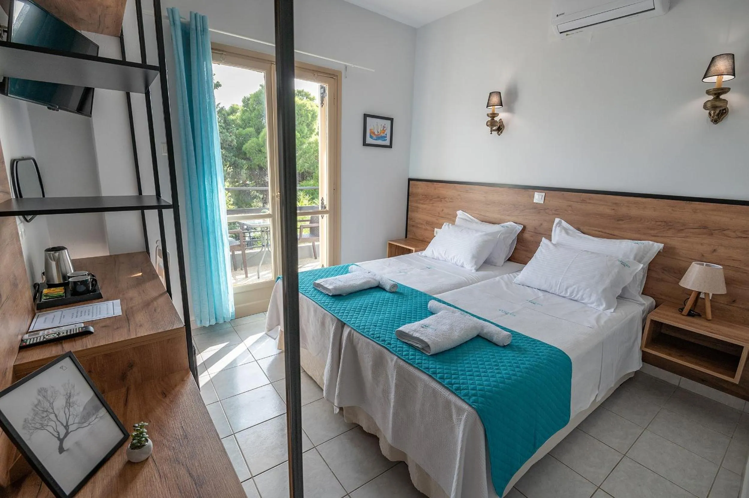 Bed in Genesis Hotel