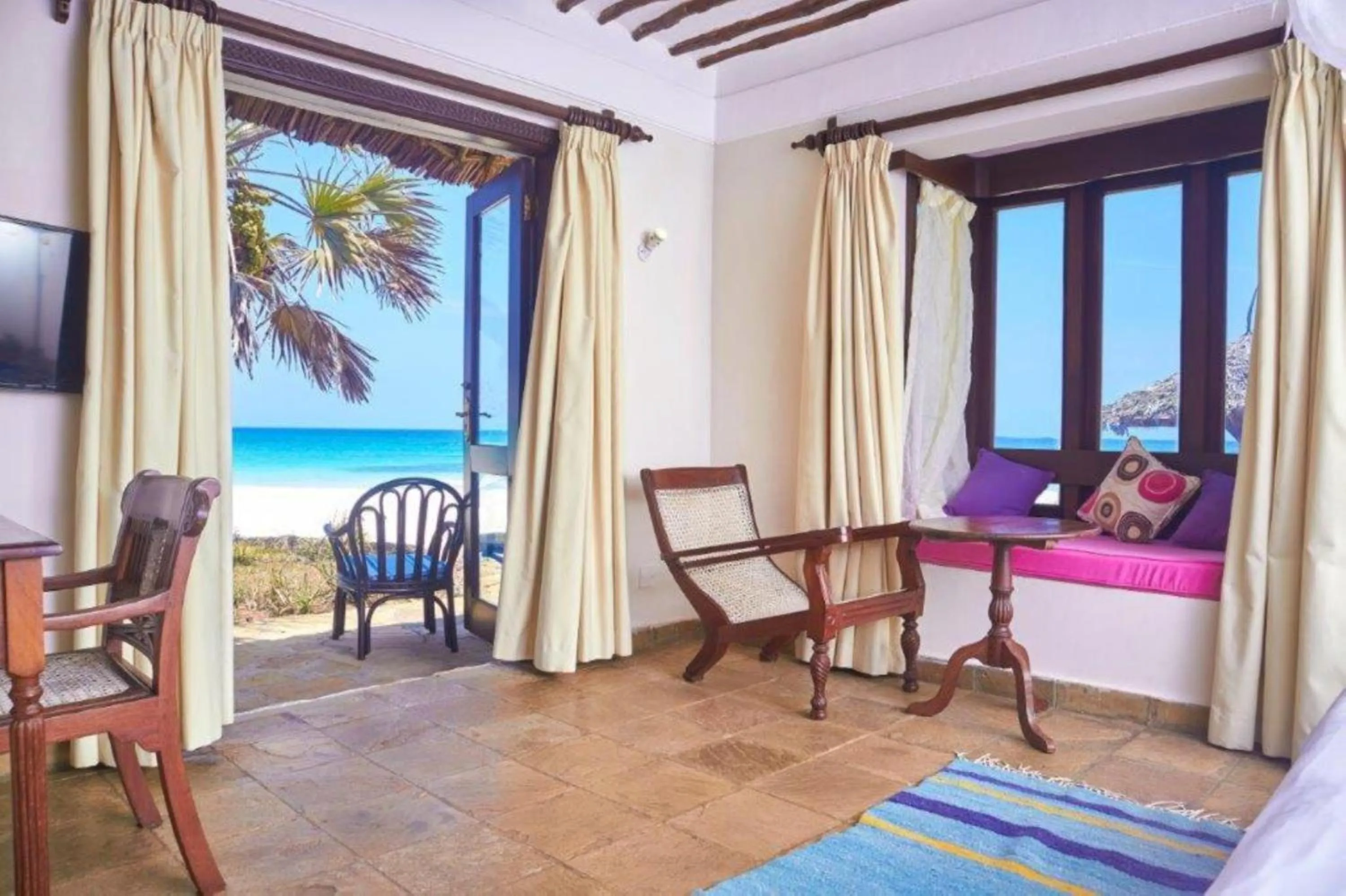 Balcony/Terrace, Bed in Jacaranda Indian Ocean Beach Resort