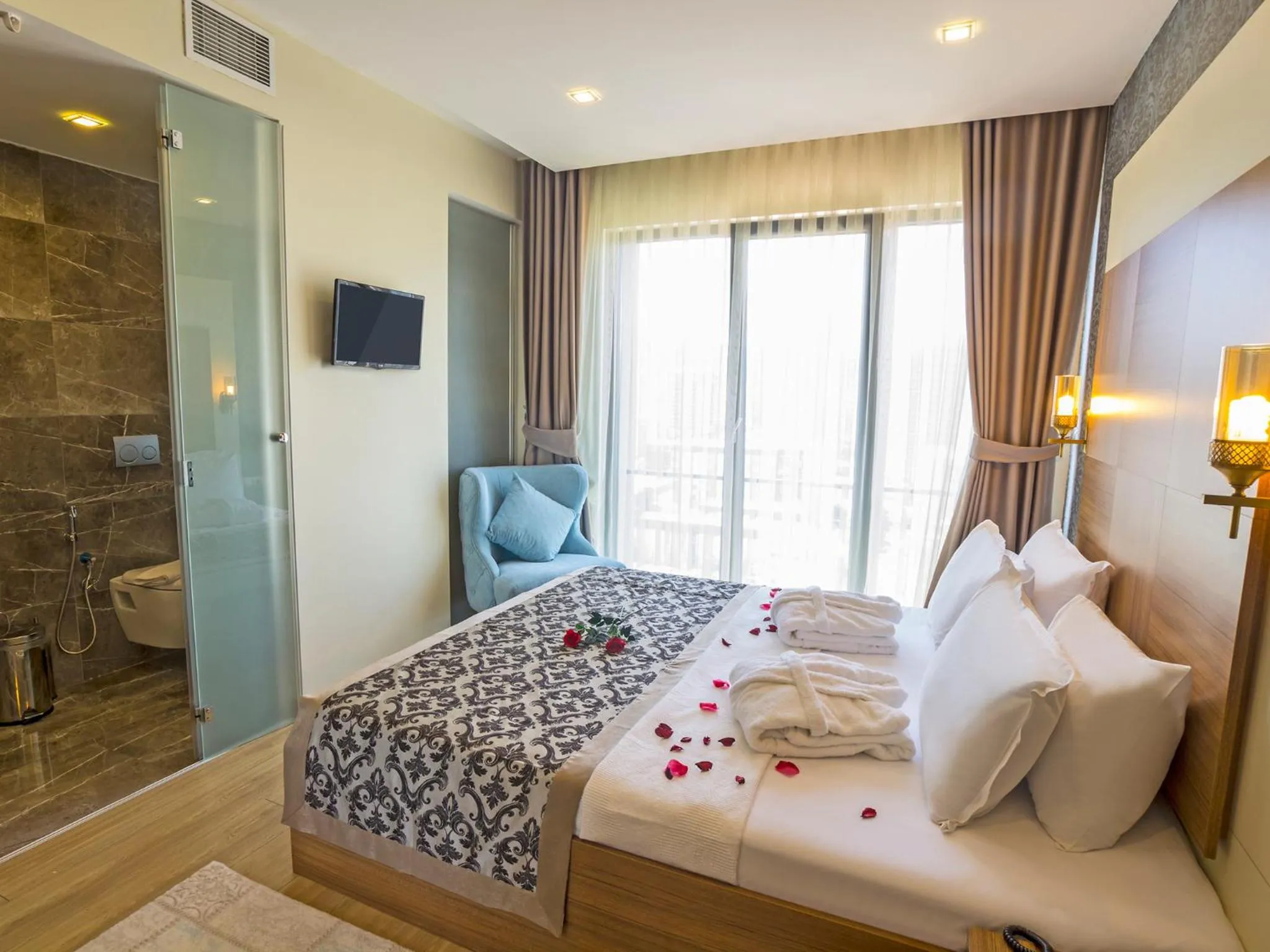 Bed in Alesha Suite Otel