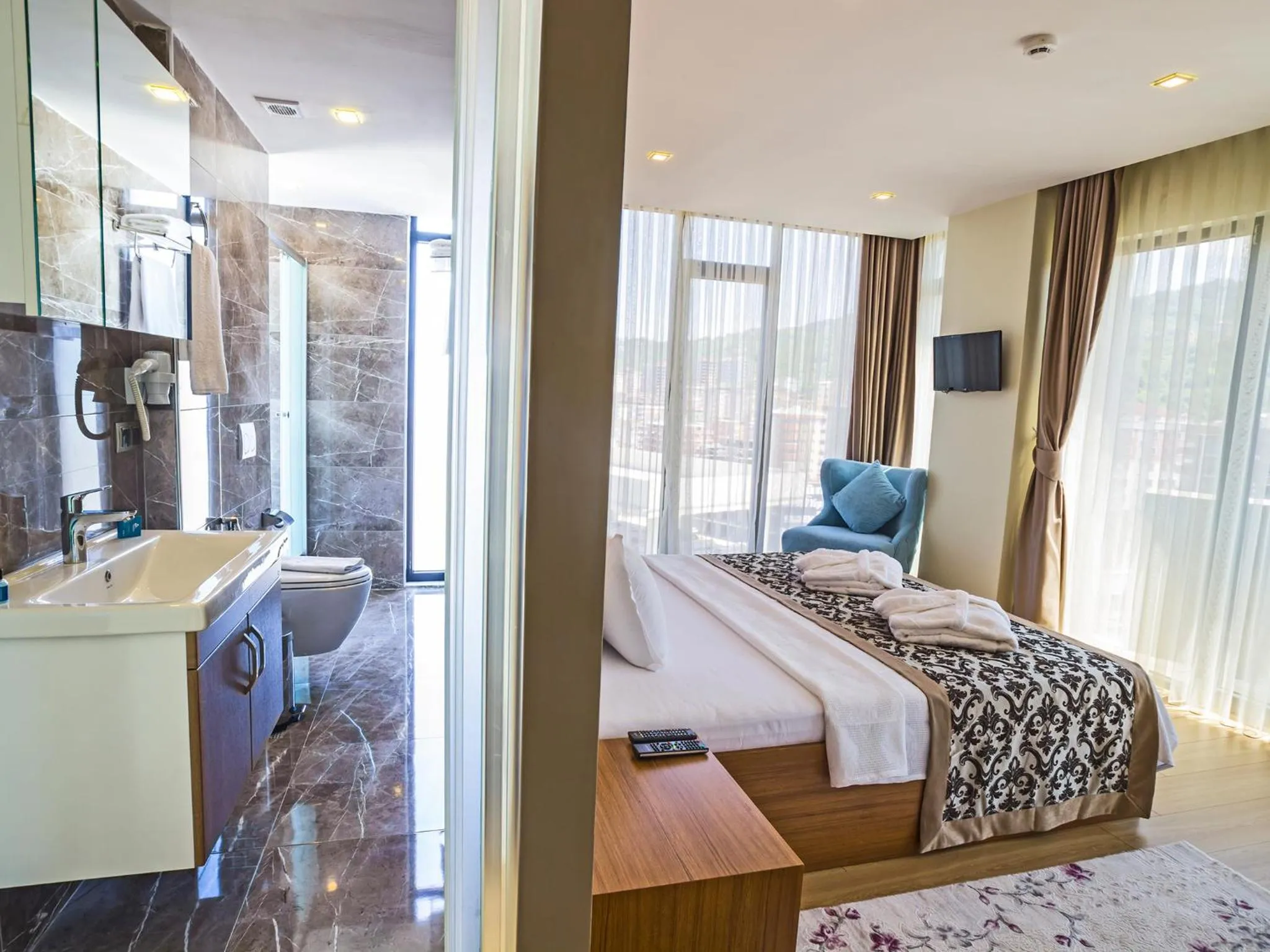 Bed in Alesha Suite Otel