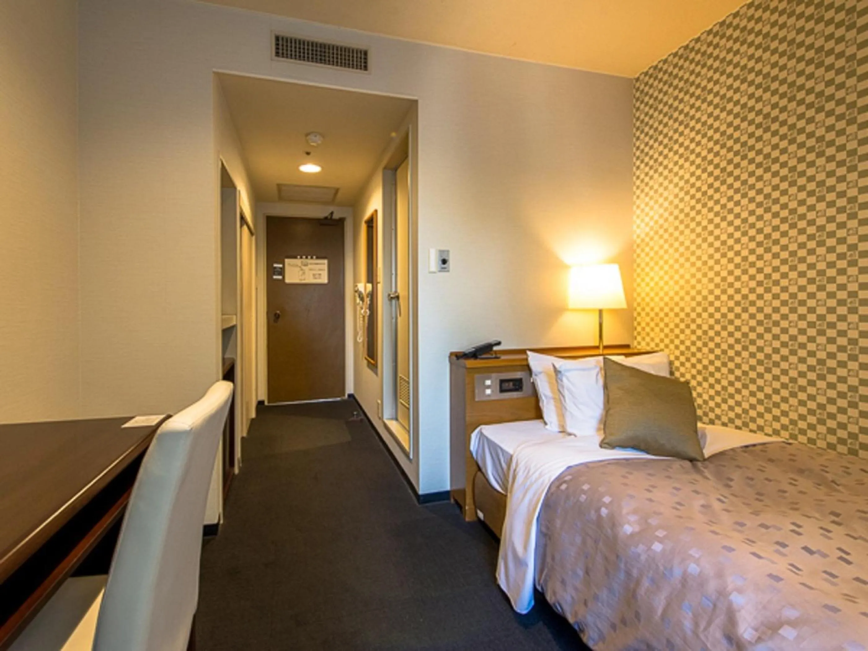 Bed in LiVEMAX RESORT Kaga Yamashiro